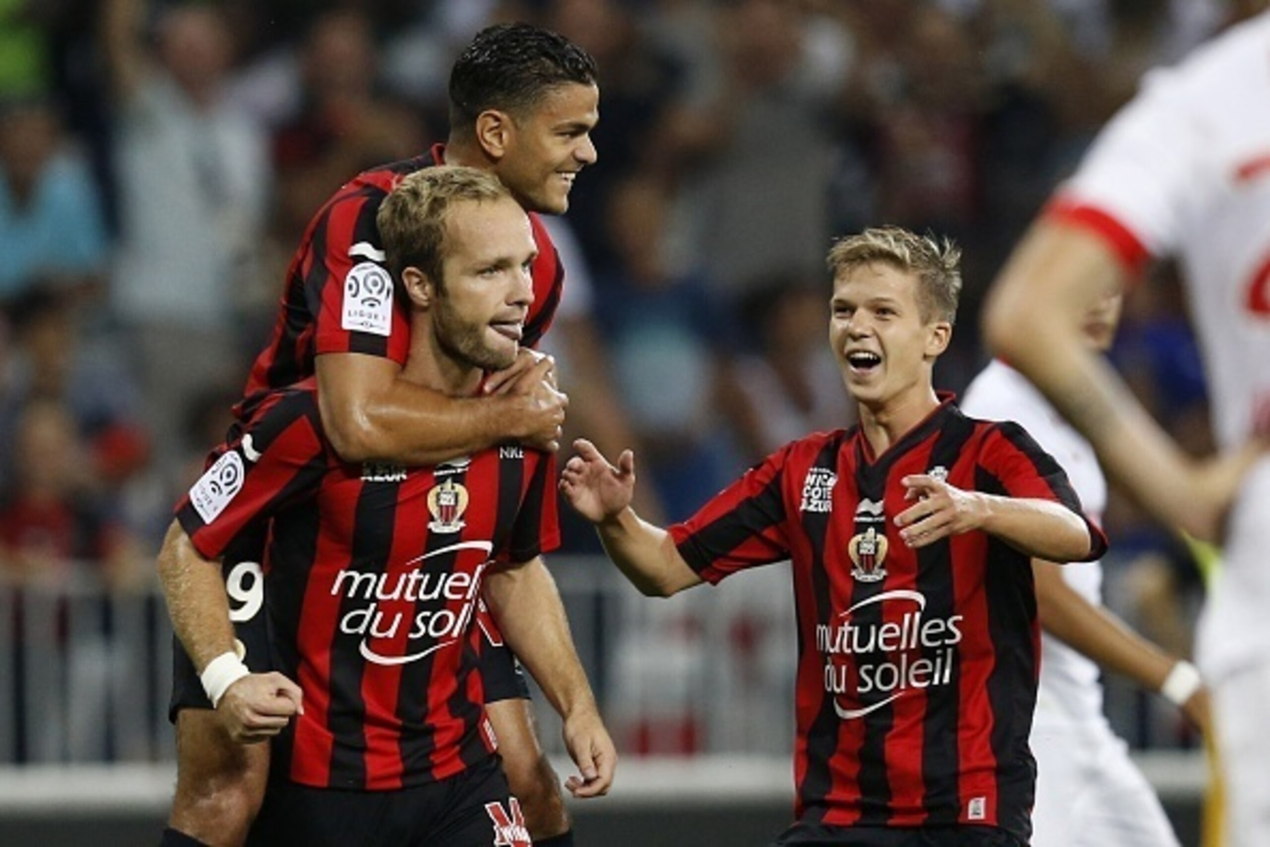 Nice's French forward Valere Germain (L) celebrates with Nice's French forward Hatem Ben Arfa (back L) and Nice's French midfielder Vincent Koziello (R) after scoring a goal during the French L1 football match between Nice and Monaco at the Allianz Rivier Nice's French forward Valere Germain (L) celebrates with Nice's French forward Hatem Ben Arfa (back L) and Nice's French midfielder Vincent Koziello (R) after scoring a goal during the French L1 football match between Nice and Monaco at the Allianz Rivier