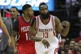 Dec 2, 2015; Houston, TX, USA; Houston Rockets guard James Harden (13) reacts after making a three point basket during the fourth quarter against the New Orleans Pelicans at Toyota Center. The Rockets defeated the Pelicans 108-101. Mandatory Credit: Troy 