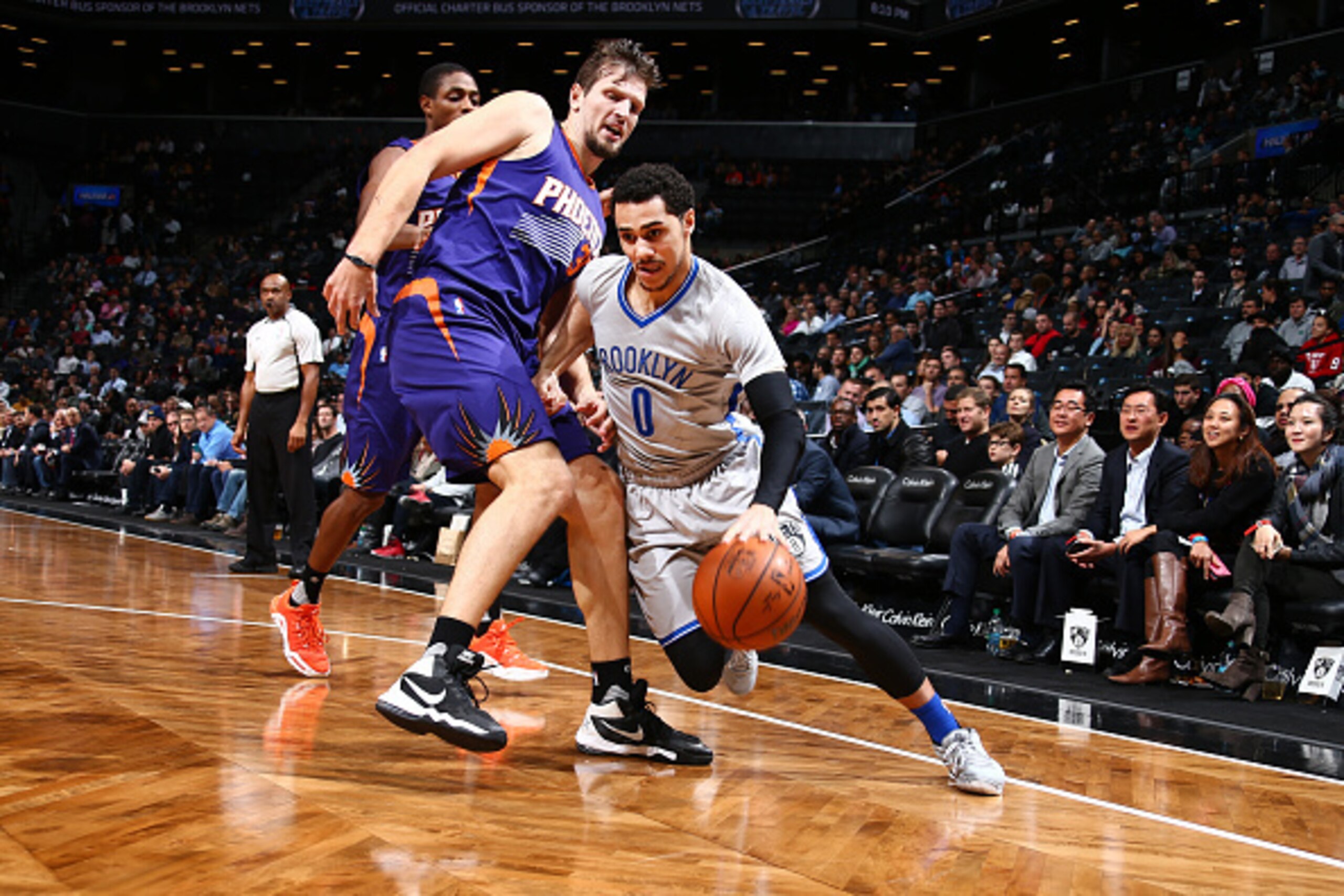 BROOKLYN, NY - DECEMBER 1: Shane Larkin #0 of the Brooklyn Nets drives to the basket against the Phoenix Suns during the game on December 1, 2015 at Barclays Center in Brooklyn, New York. NOTE TO USER: User expressly acknowledges and agrees that, by downl BROOKLYN, NY - DECEMBER 1: Shane Larkin #0 of the Brooklyn Nets drives to the basket against the Phoenix Suns during the game on December 1, 2015 at Barclays Center in Brooklyn, New York. NOTE TO USER: User expressly acknowledges and agrees that, by downl