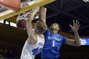 Dec 3, 2015; Los Angeles, CA, USA; UCLA Bruins center Thomas Welsh (40) dunks the ball against Kentucky Wildcats forward Skal Labissiere (1) during the second half at Pauley Pavilion. Mandatory Credit: Richard Mackson-USA TODAY Sports