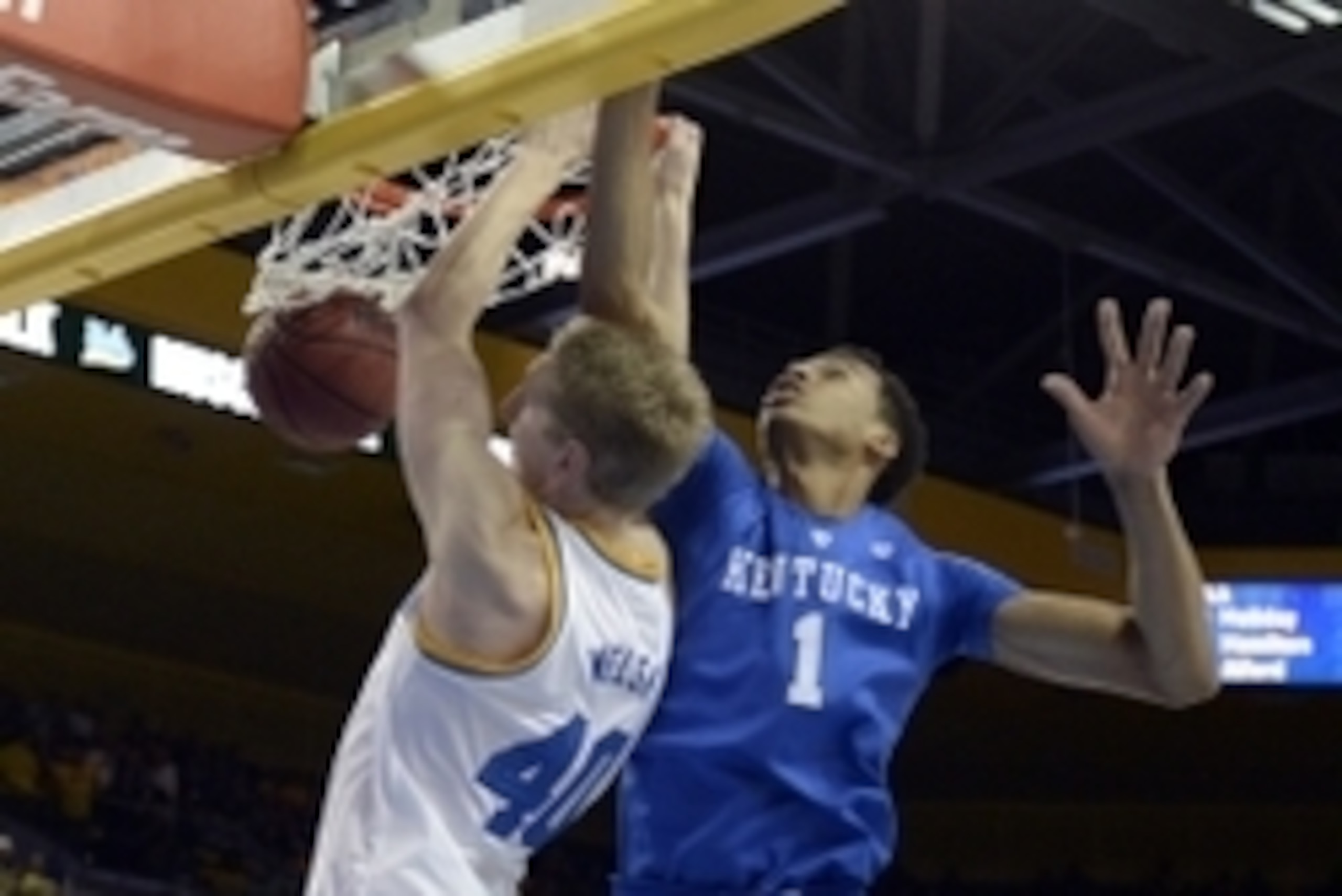 Dec 3, 2015; Los Angeles, CA, USA; UCLA Bruins center Thomas Welsh (40) dunks the ball against Kentucky Wildcats forward Skal Labissiere (1) during the second half at Pauley Pavilion. Mandatory Credit: Richard Mackson-USA TODAY Sports