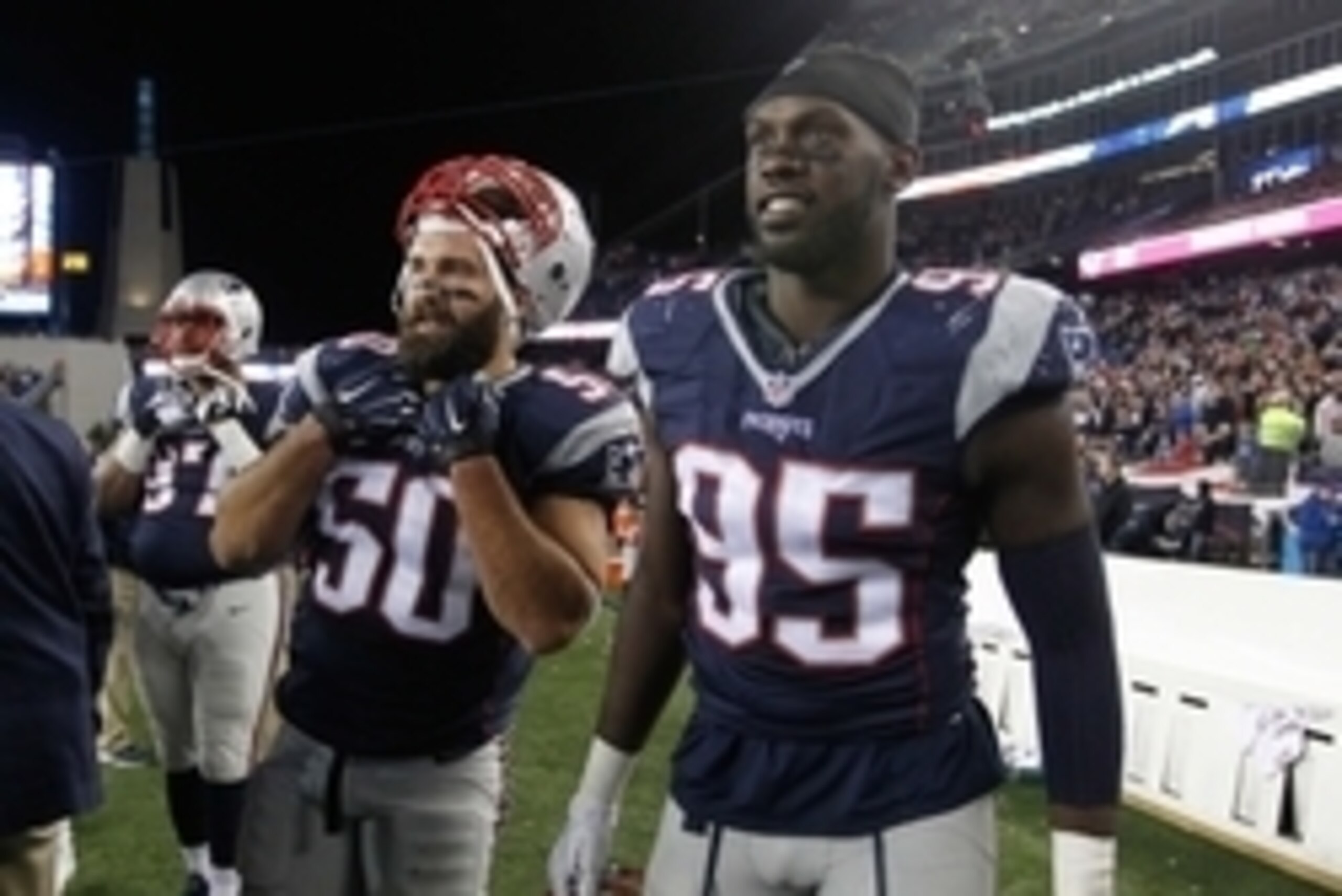 Oct 29, 2015; Foxborough, MA, USA; New England Patriots defensive end Rob Ninkovich (50) and defensive end Chandler Jones (95) on the sideline during the fourth quarter against the Miami Dolphins at Gillette Stadium. Mandatory Credit: Stew Milne-USA TODAY