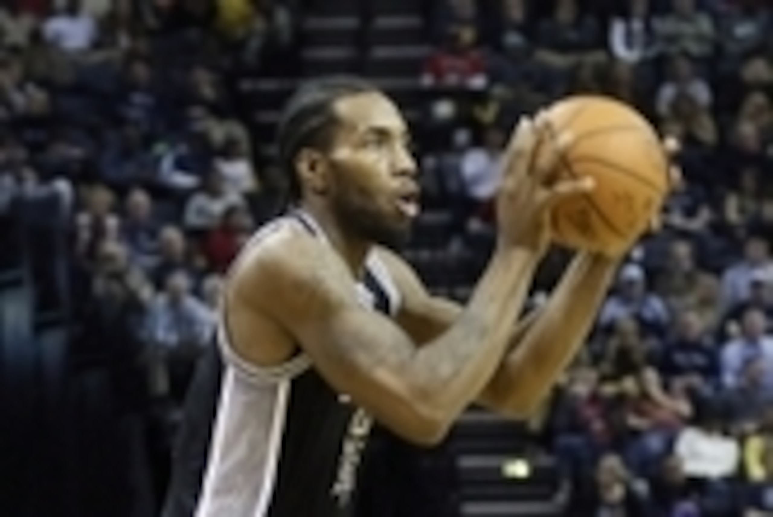 Dec 3, 2015; Memphis, TN, USA; San Antonio Spurs forward Kawhi Leonard (2) shoots a three point shot in the fourth quarter against the Memphis Grizzlies at FedExForum. San Antonio defeated Memphis 103-83. Mandatory Credit: Nelson Chenault-USA TODAY Sports Dec 3, 2015; Memphis, TN, USA; San Antonio Spurs forward Kawhi Leonard (2) shoots a three point shot in the fourth quarter against the Memphis Grizzlies at FedExForum. San Antonio defeated Memphis 103-83. Mandatory Credit: Nelson Chenault-USA TODAY Sports