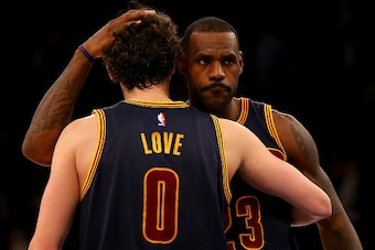 NEW YORK, NY - NOVEMBER 13:  LeBron James #23 and Kevin Love #0 of the Cleveland Cavaliers celebrate the win over the New York Knicks at Madison Square Garden on November 13, 2015 in New York City.NOTE TO USER: User expressly acknowledges and agrees that,