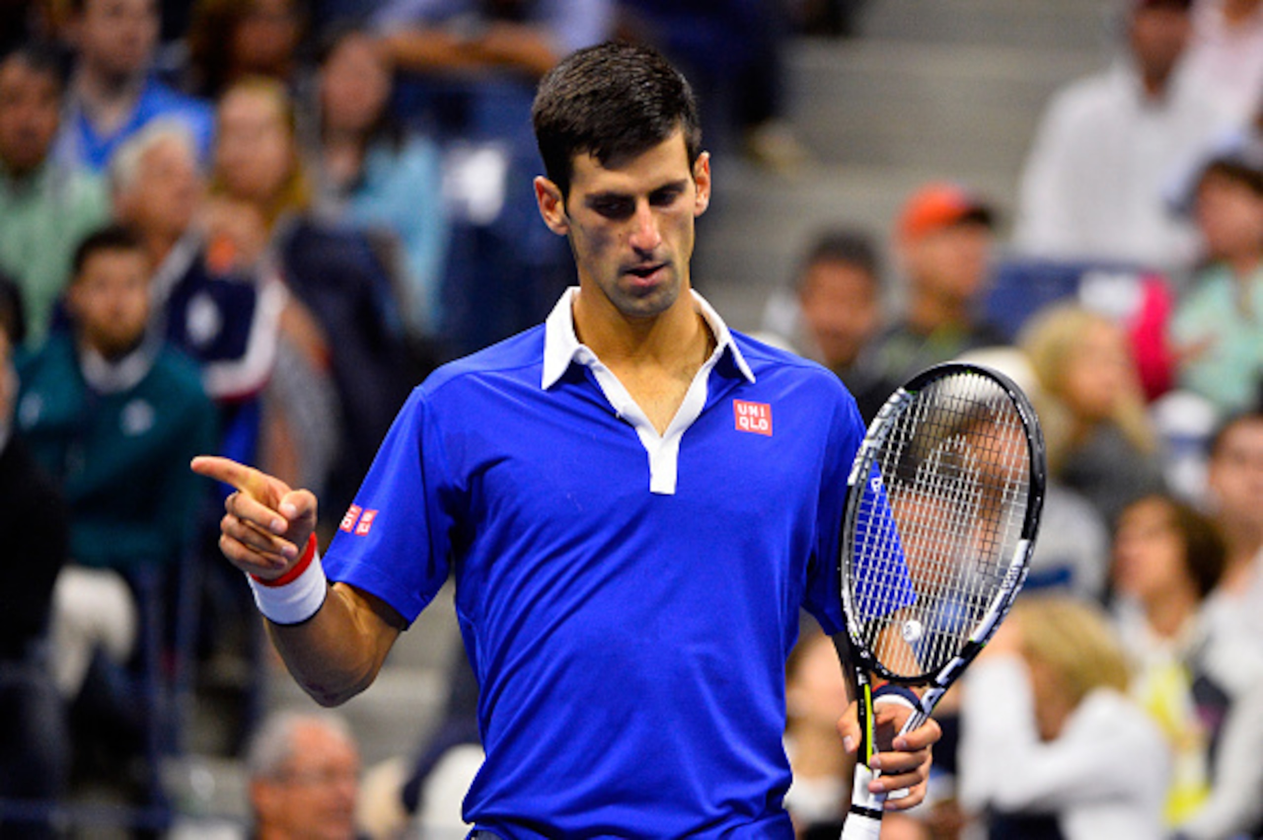 NEW YORK, NY - SEPTEMBER 13:  Novak Djokovic of Serbia reacts against Roger Federer of Switzerland during their Men's Singles Final match on Day Fourteen of the 2015 US Open at the USTA Billie Jean King National Tennis Center on September 13, 2015 in the 
