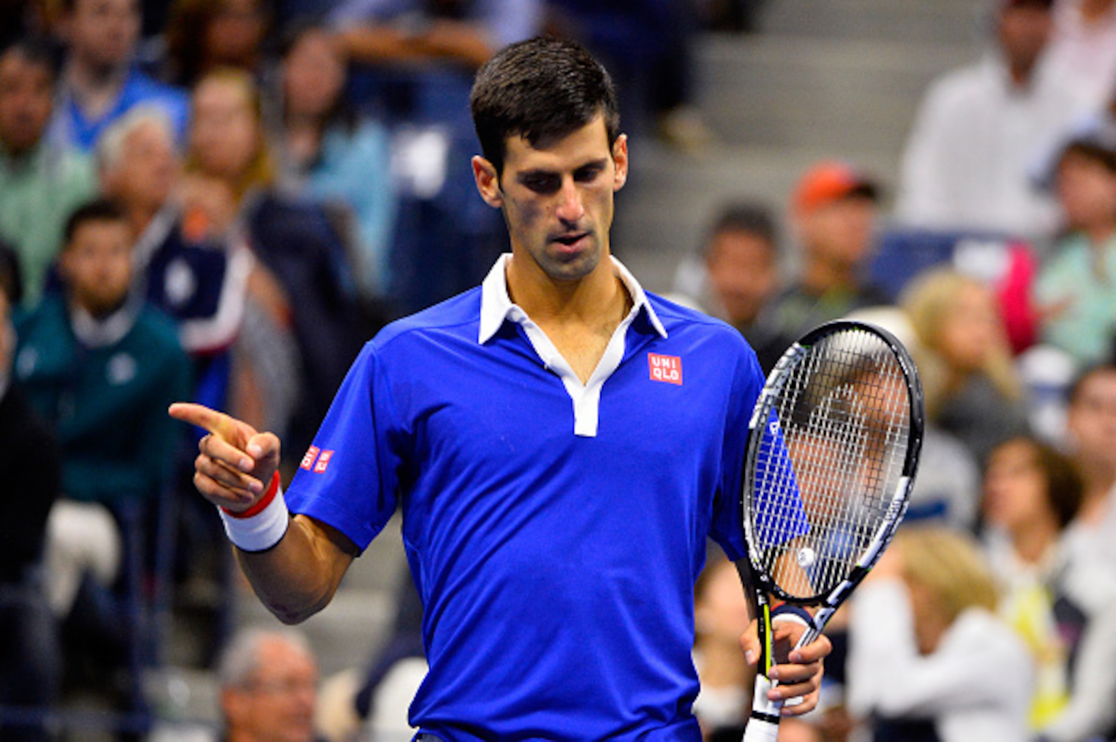 NEW YORK, NY - SEPTEMBER 13:  Novak Djokovic of Serbia reacts against Roger Federer of Switzerland during their Men's Singles Final match on Day Fourteen of the 2015 US Open at the USTA Billie Jean King National Tennis Center on September 13, 2015 in the 