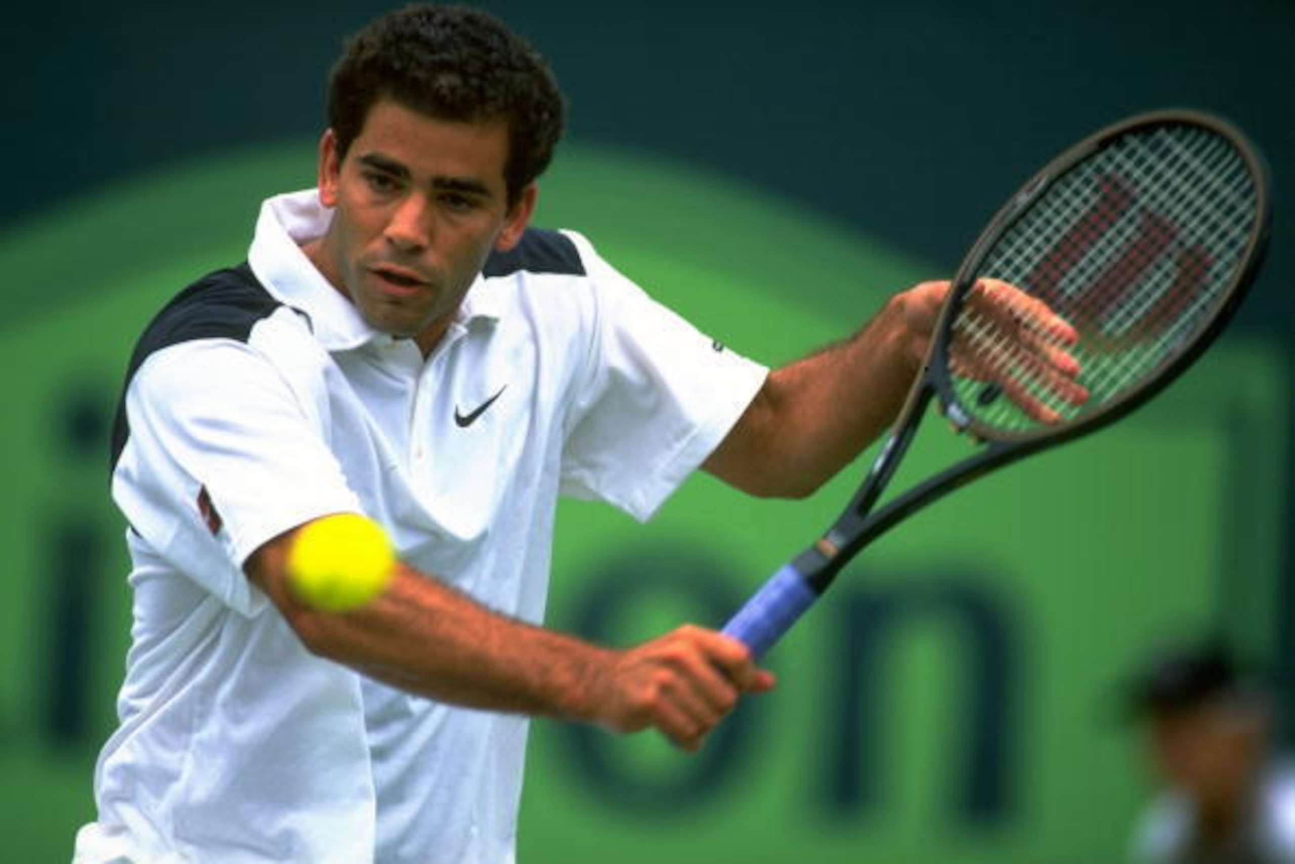 23 Mar 1998:  Pete Sampras of the USA plays a backhand return during the Lipton Championships in Key Biscayne, Florida, USA. \ Mandatory Credit: Al  Bello/Allsport