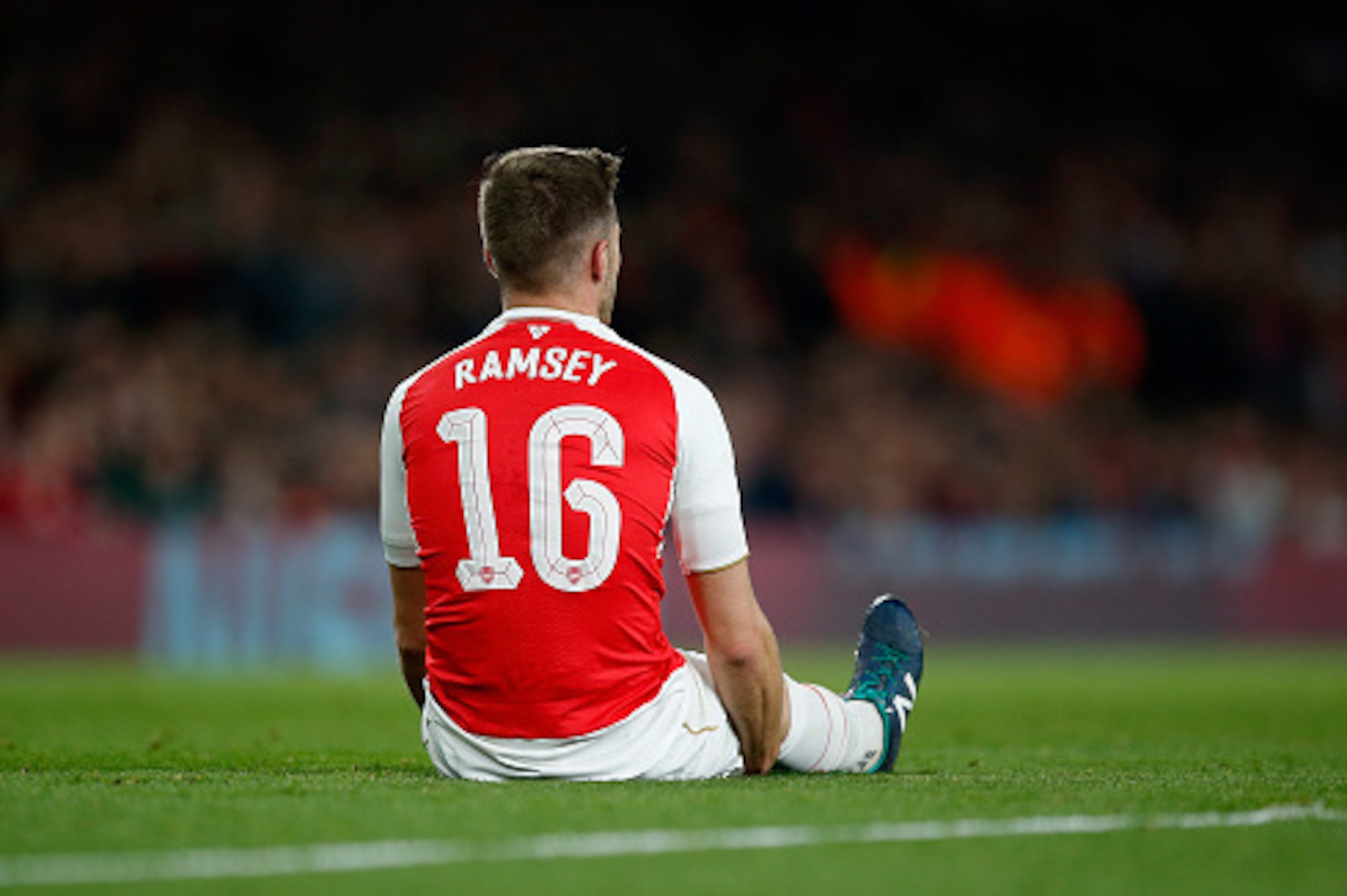 LONDON, ENGLAND - OCTOBER 20:  Aaron Ramsey of Arsenal receives an injury during the UEFA Champions League Group F match between Arsenal FC and FC Bayern Munchen at the Emirates Stadium on October 20, 2015 in London, United Kingdom.  (Photo by Boris Streu