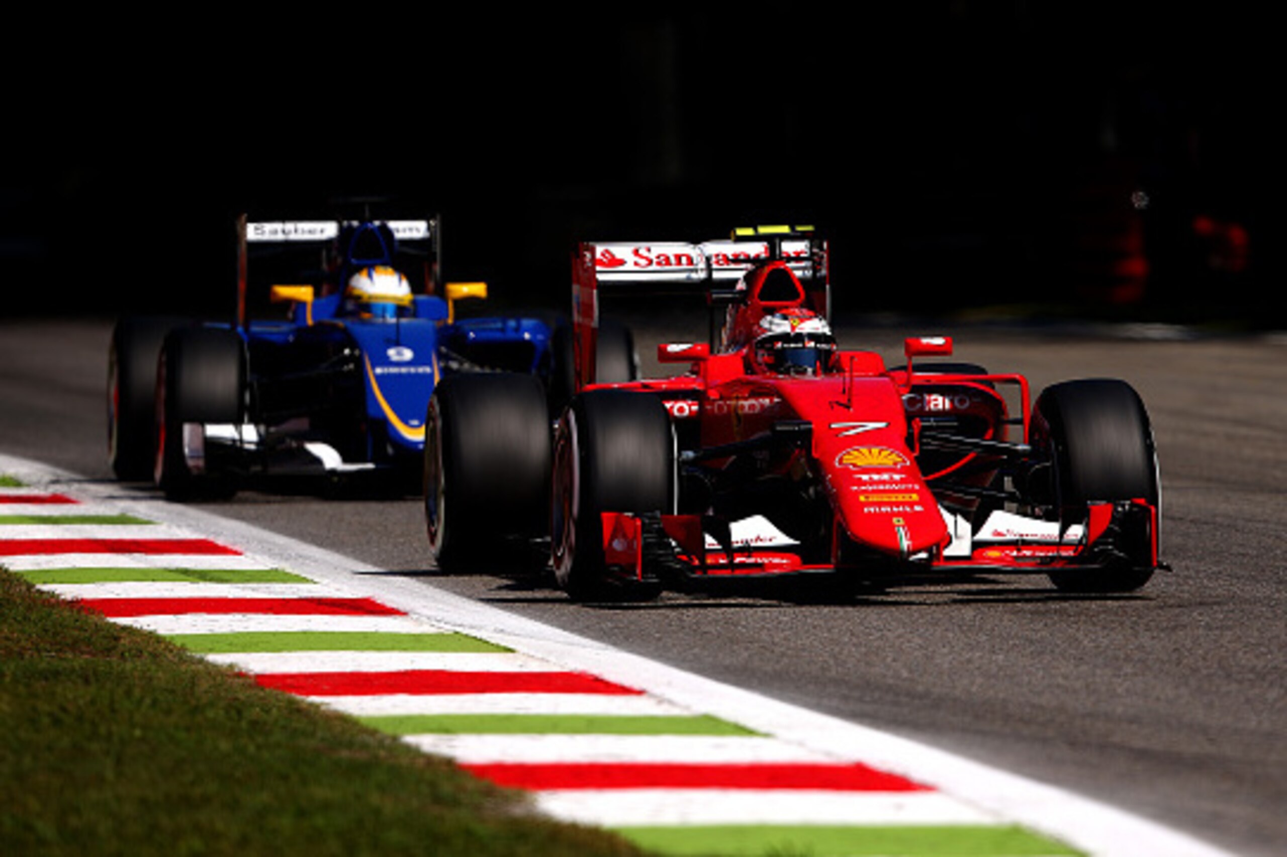 MONZA, ITALY - SEPTEMBER 05: Kimi Raikkonen of Finland and Ferrari drives ahead of Marcus Ericsson of Sweden and Sauber F1 during qualifying for the Formula One Grand Prix of Italy at Autodromo di Monza on September 5, 2015 in Monza, Italy. (Photo by Br MONZA, ITALY - SEPTEMBER 05: Kimi Raikkonen of Finland and Ferrari drives ahead of Marcus Ericsson of Sweden and Sauber F1 during qualifying for the Formula One Grand Prix of Italy at Autodromo di Monza on September 5, 2015 in Monza, Italy. (Photo by Br
