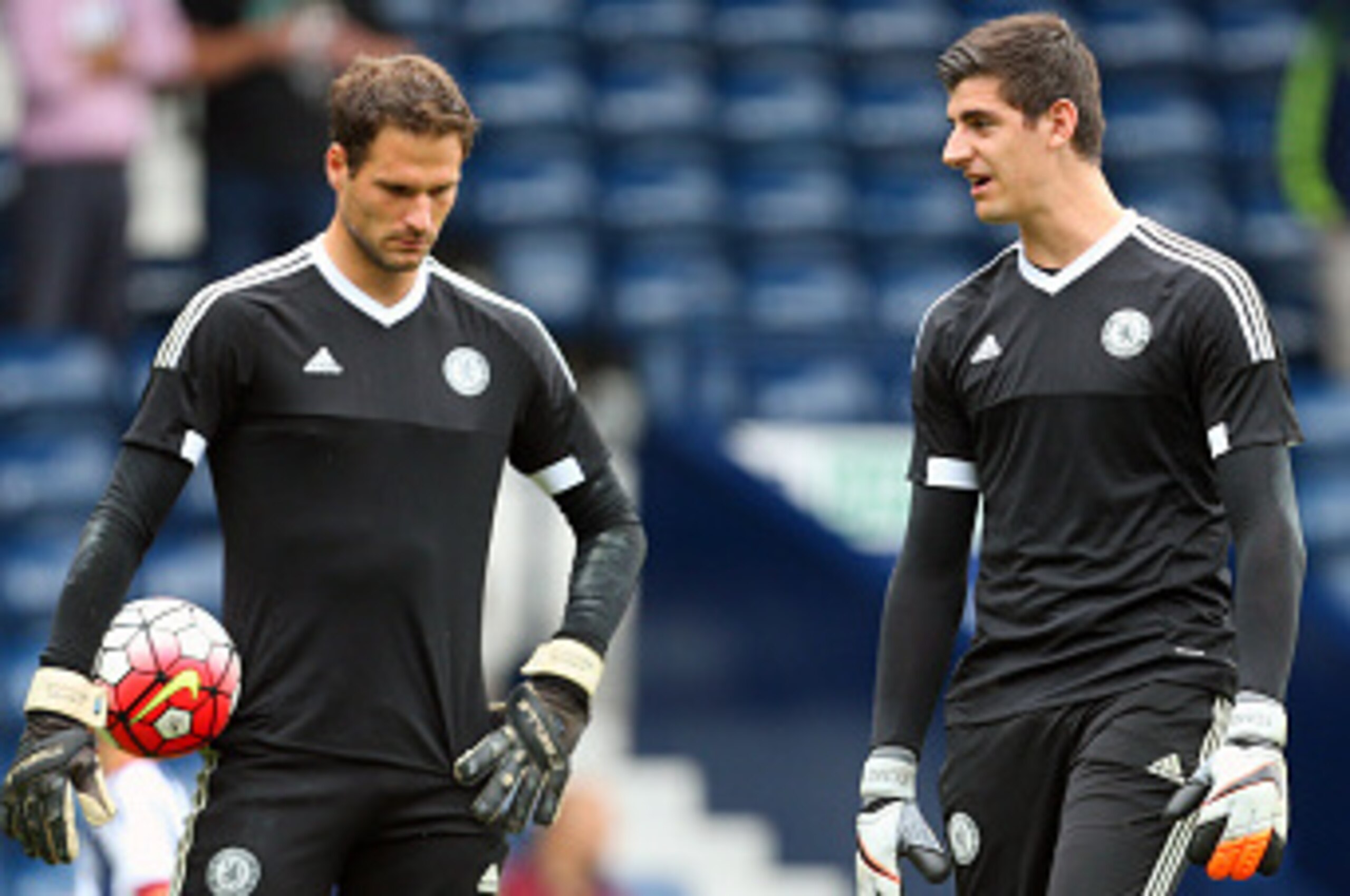 WEST BROMWICH, ENGLAND - AUGUST 23: Asmir Begovic of Chelsea and Thibaut Courtois of Chelsea before the Barclays Premier League match between West Bromwich Albion and Chelsea on August 23, 2015 in West Bromwich, United Kingdom. (Photo by Catherine Ivill WEST BROMWICH, ENGLAND - AUGUST 23: Asmir Begovic of Chelsea and Thibaut Courtois of Chelsea before the Barclays Premier League match between West Bromwich Albion and Chelsea on August 23, 2015 in West Bromwich, United Kingdom. (Photo by Catherine Ivill