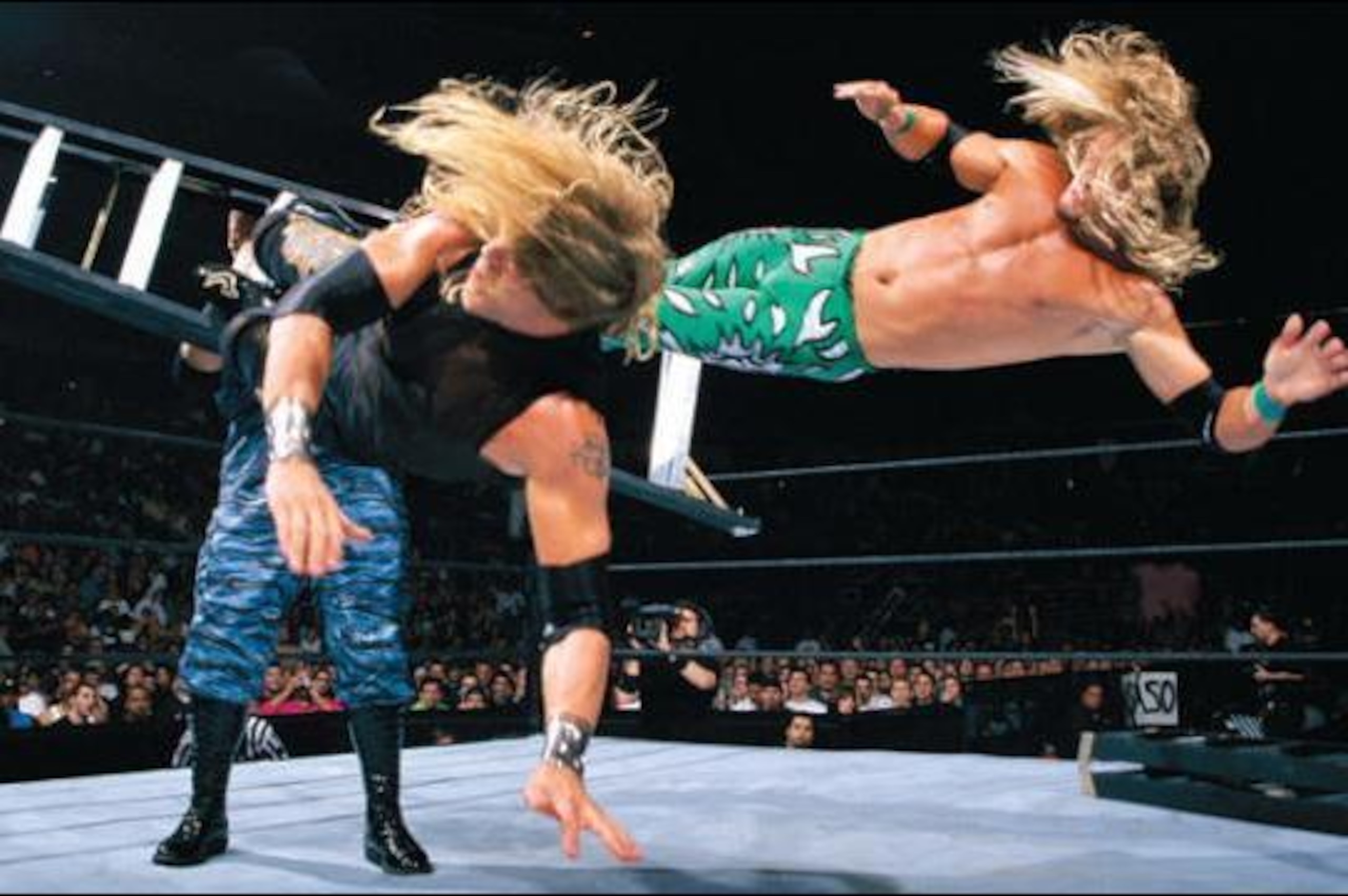 Edge and Christian dropkick Bubba Dudley.
