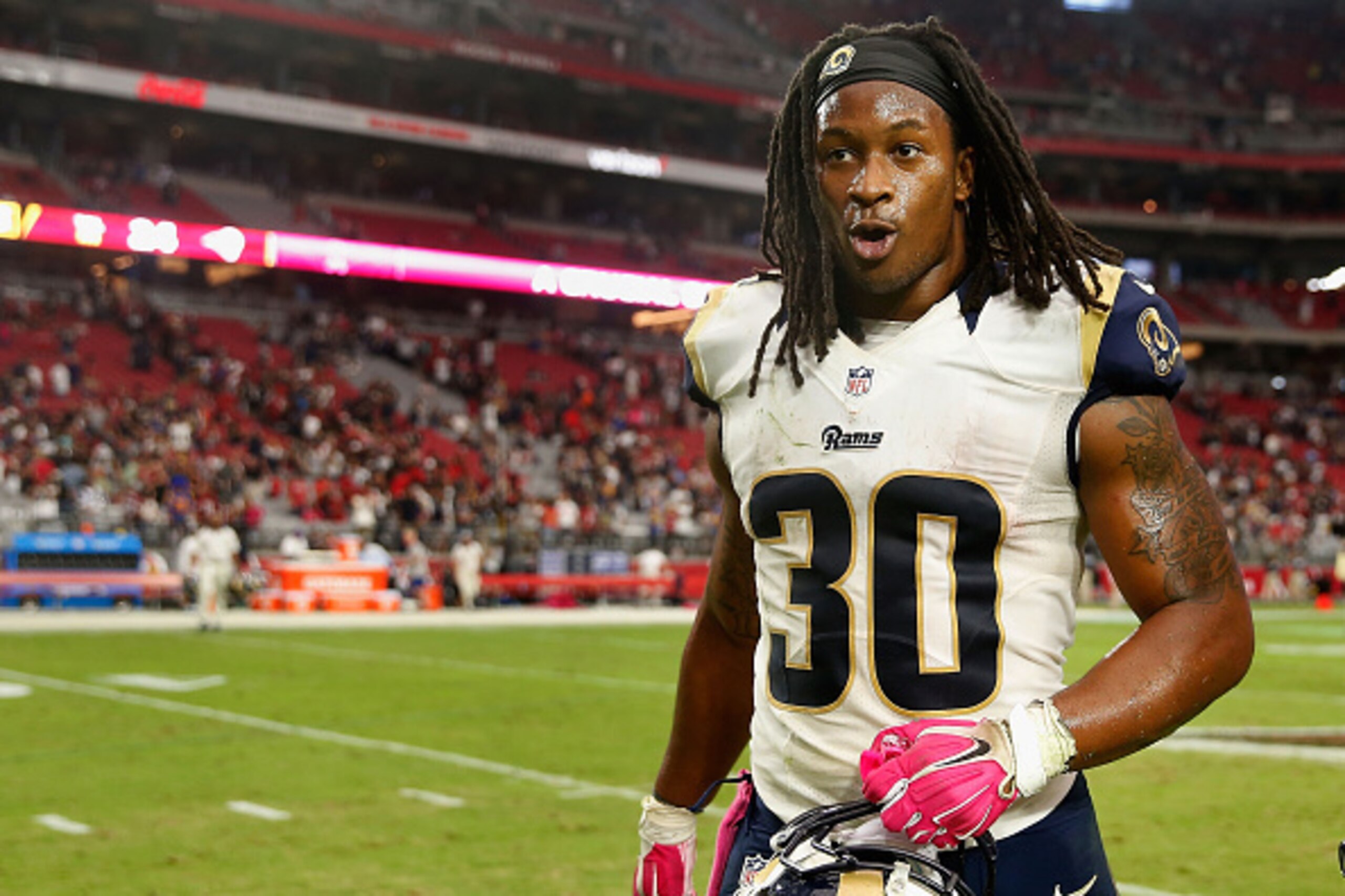 GLENDALE, AZ - OCTOBER 04:  Running back Todd Gurley #30 of the St. Louis Rams walks off the field following the NFL game against the Arizona Cardinals at the University of Phoenix Stadium on October 4, 2015 in Glendale, Arizona. The Rams defeated the Car