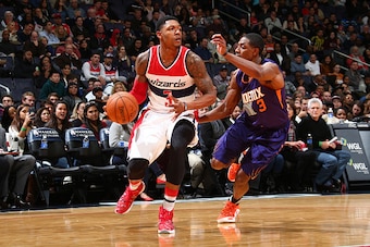 WASHINGTON, DC - DECEMBER 4: Bradley Beal #3 of the Washington Wizards drives to the basket against Brandon Knight #3 of the Phoenix Suns on December 4, 2015 at Verizon Center in Washington, DC. NOTE TO USER: User expressly acknowledges and agrees that, WASHINGTON, DC - DECEMBER 4: Bradley Beal #3 of the Washington Wizards drives to the basket against Brandon Knight #3 of the Phoenix Suns on December 4, 2015 at Verizon Center in Washington, DC. NOTE TO USER: User expressly acknowledges and agrees that,
