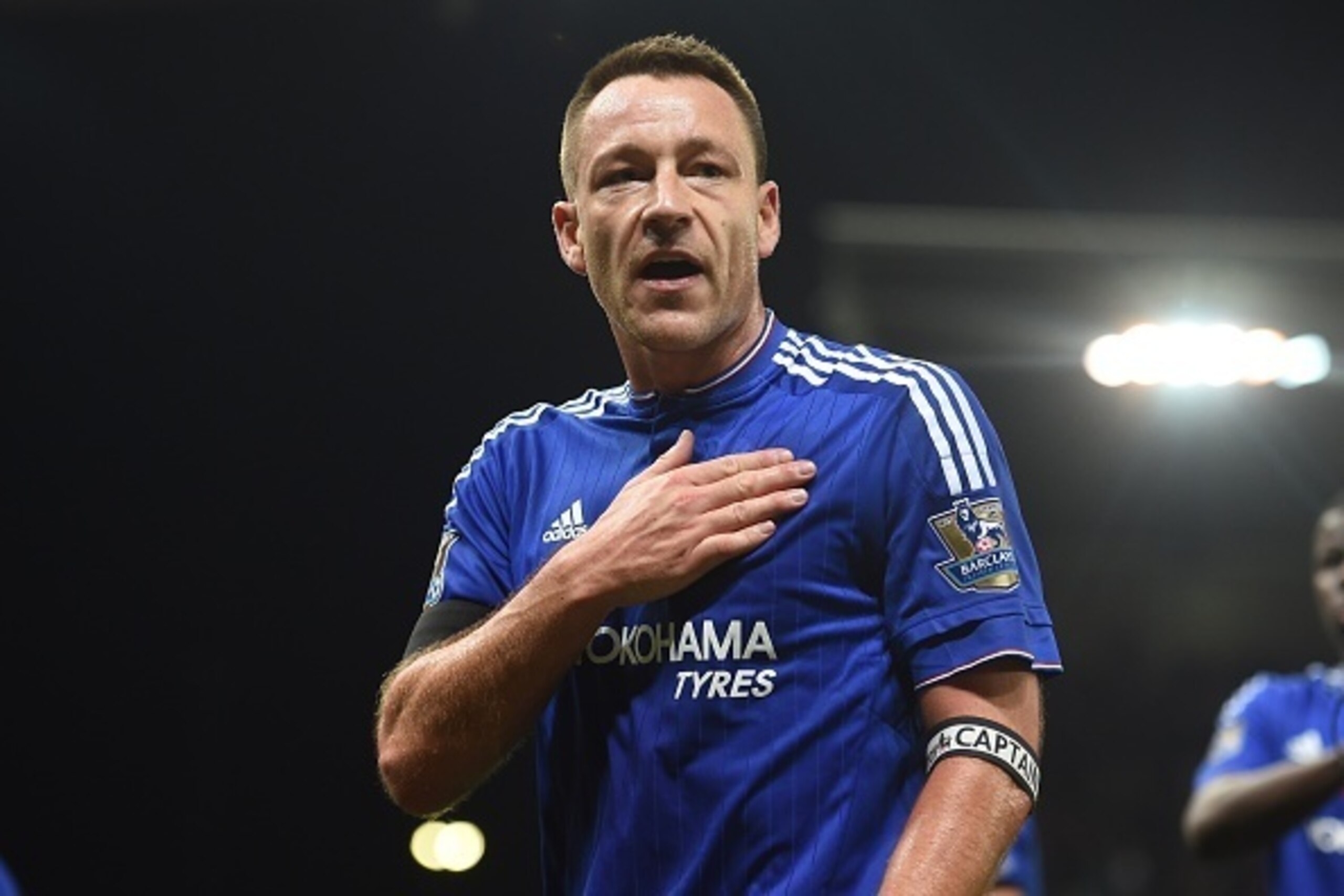 Chelsea's English defender John Terry gestures on the pitch after the English Premier League football match between Stoke City and Chelsea at the Britannia Stadium in Stoke-on-Trent, central England on November 7, 2015. Stoke won the game 1-0. AFP PHOTO /