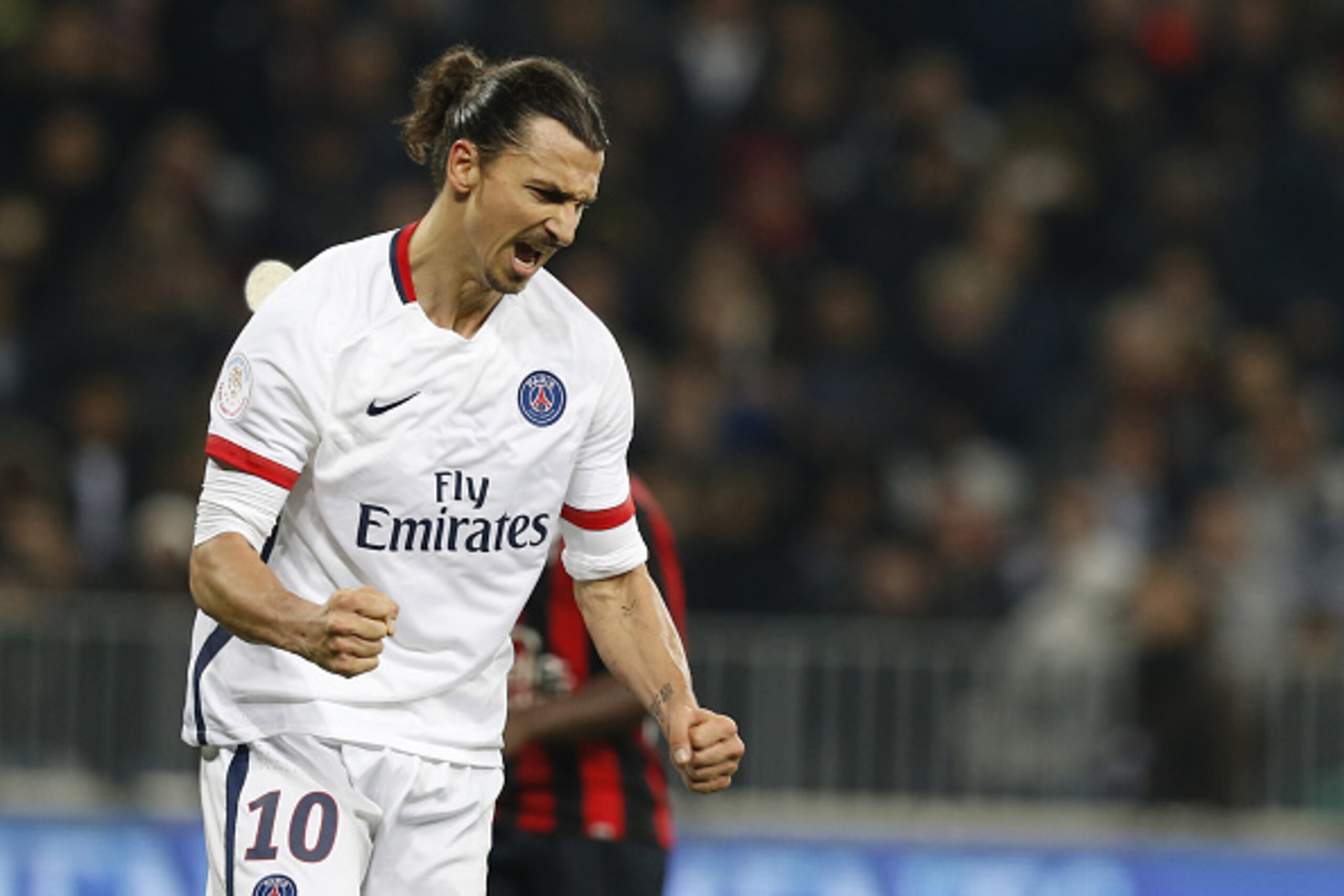 Paris Saint-Germain's Swedish forward Zlatan Ibrahimovic celebrates after scoring a penalty during the French L1 football match Nice (OGC Nice) vs Paris Saint-Germain (PSG) on December 4, 2015 at the 'Allianz Riviera' stadium in Nice, southeastern France.
