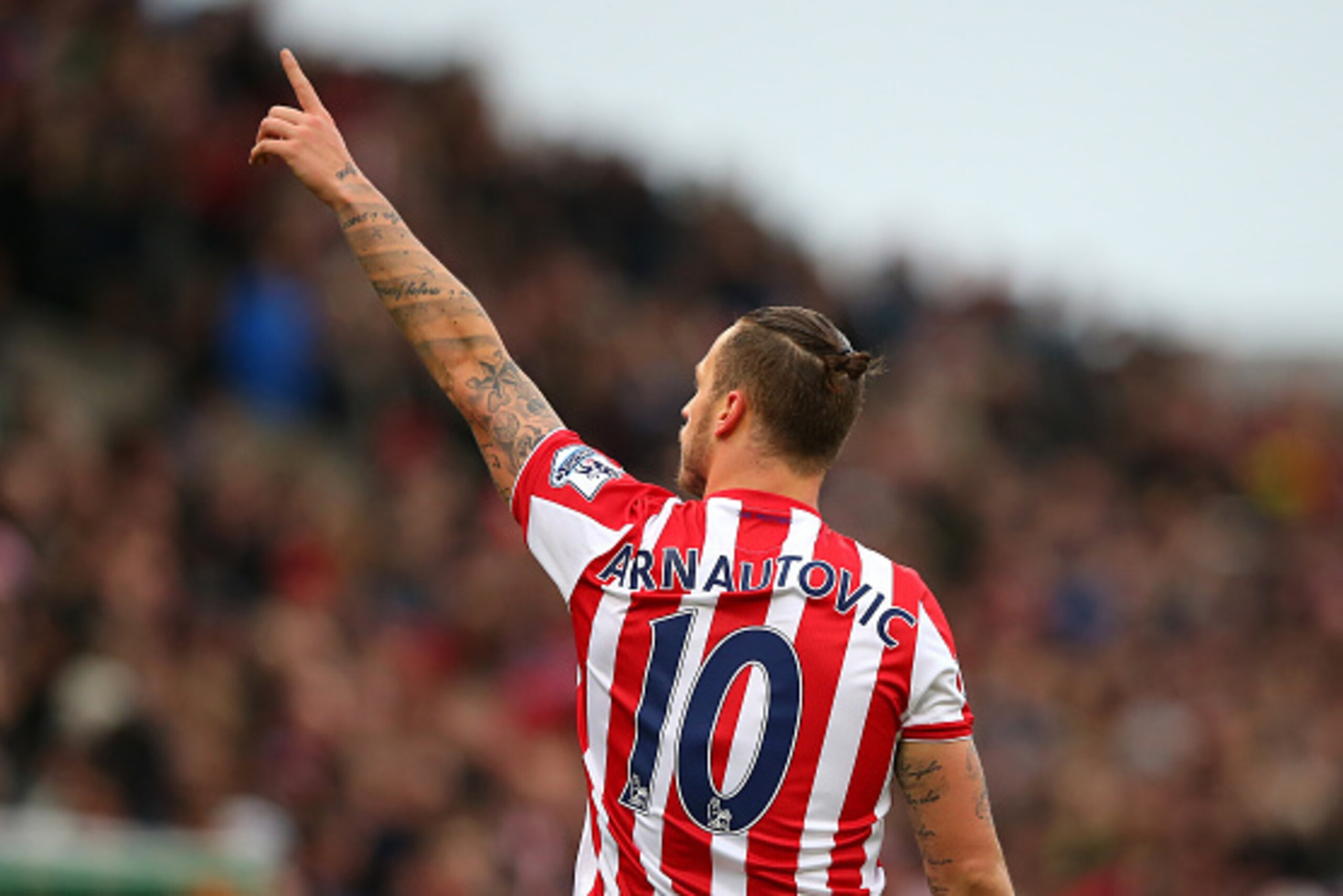 STOKE ON TRENT, ENGLAND - DECEMBER 05:  Marko Arnautovic (L) of Stoke City celebrates scoring his team's second goal during the Barclays Premier League match between Stoke City and Manchester City at Britannia Stadium on December 5, 2015 in Stoke on Trent