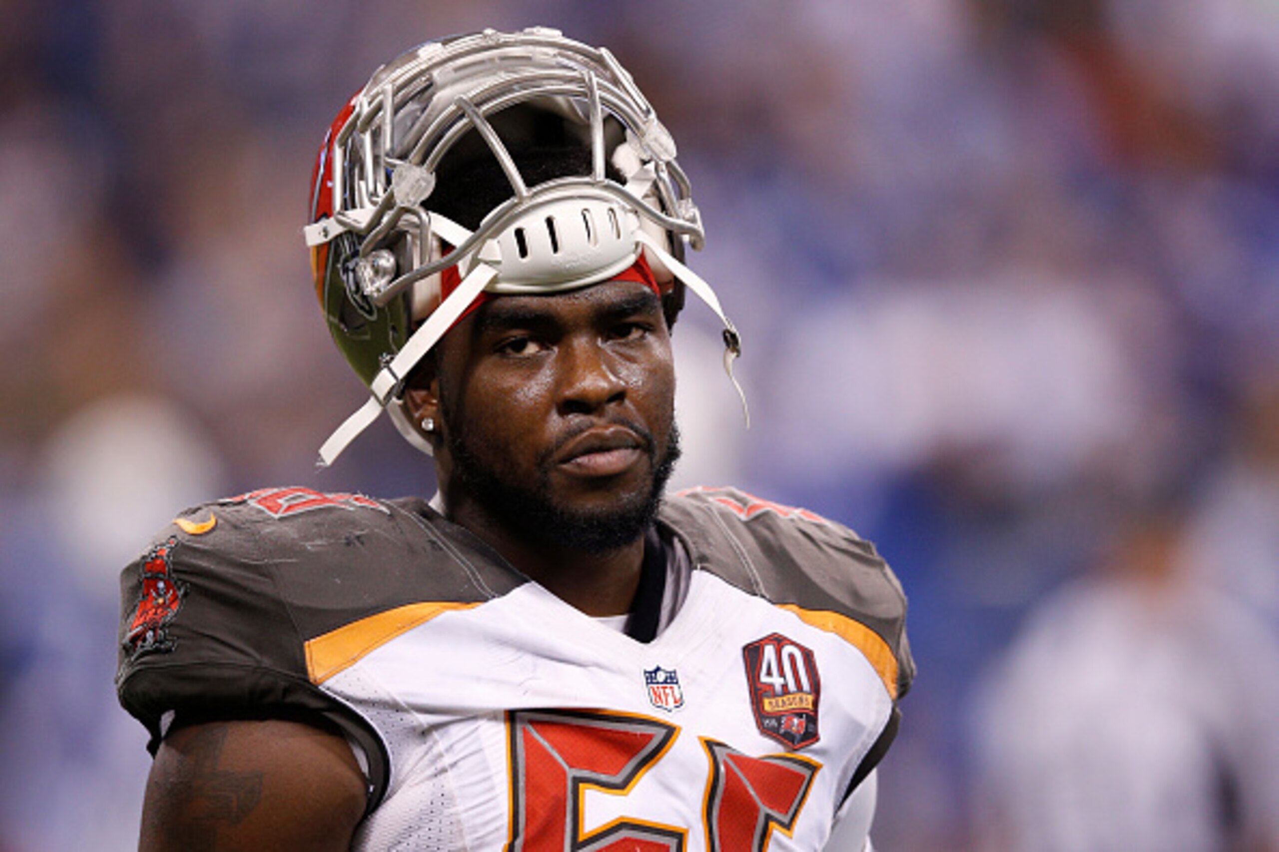 INDIANAPOLIS, IN - NOVEMBER 29: Jacquies Smith #56 of the Tampa Bay Buccaneers looks on against the Indianapolis Colts during the game at Lucas Oil Stadium on November 29, 2015 in Indianapolis, Indiana. The Colts defeated the Bucs 25-12. (Photo by Joe Rob