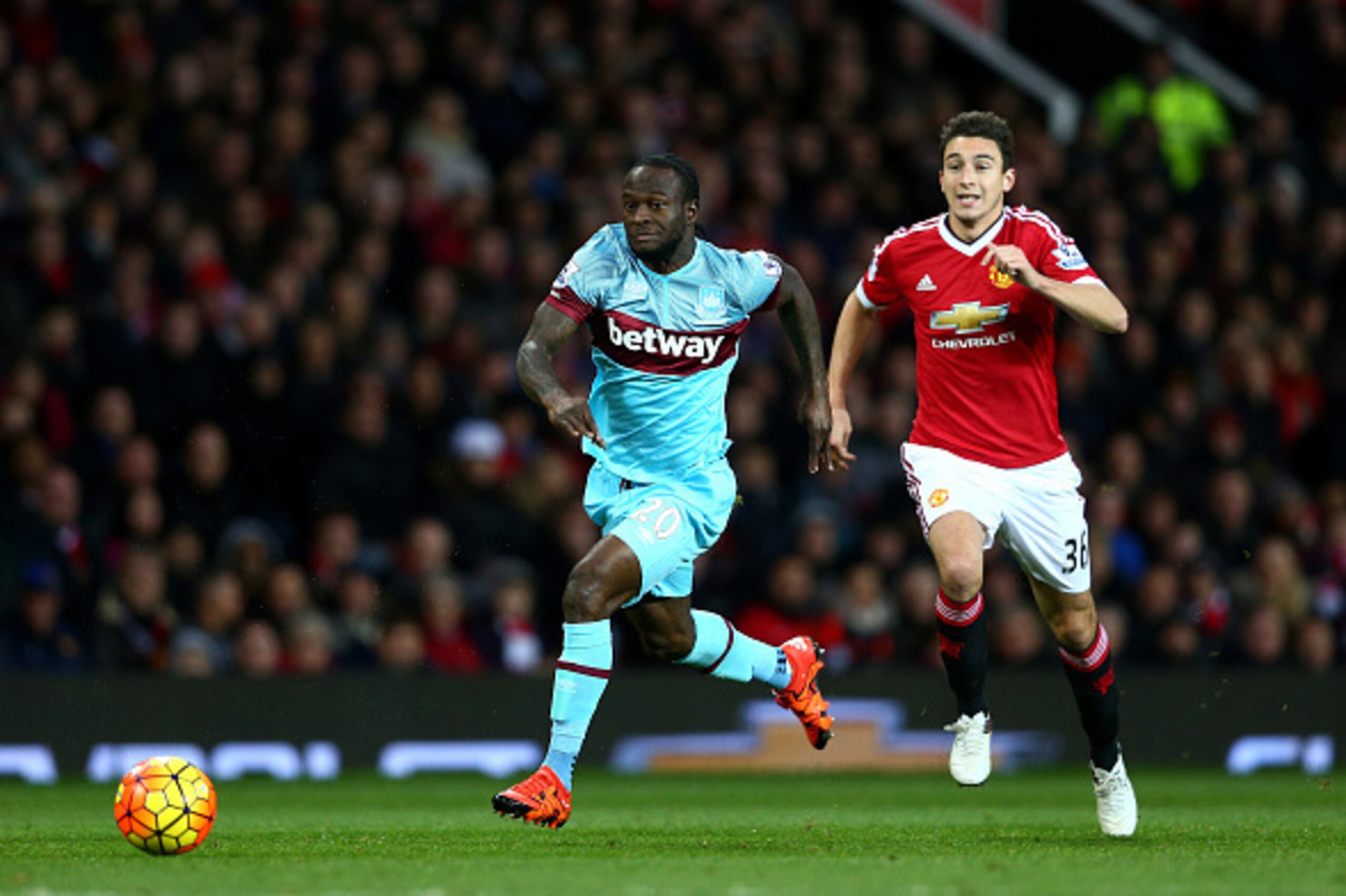 MANCHESTER, ENGLAND - DECEMBER 05: Victor Moses of West Ham United and Matteo Darmian of Manchester United compete for the ball during the Barclays Premier League match between Manchester United and West Ham United at Old Trafford on December 5, 2015 in M MANCHESTER, ENGLAND - DECEMBER 05: Victor Moses of West Ham United and Matteo Darmian of Manchester United compete for the ball during the Barclays Premier League match between Manchester United and West Ham United at Old Trafford on December 5, 2015 in M
