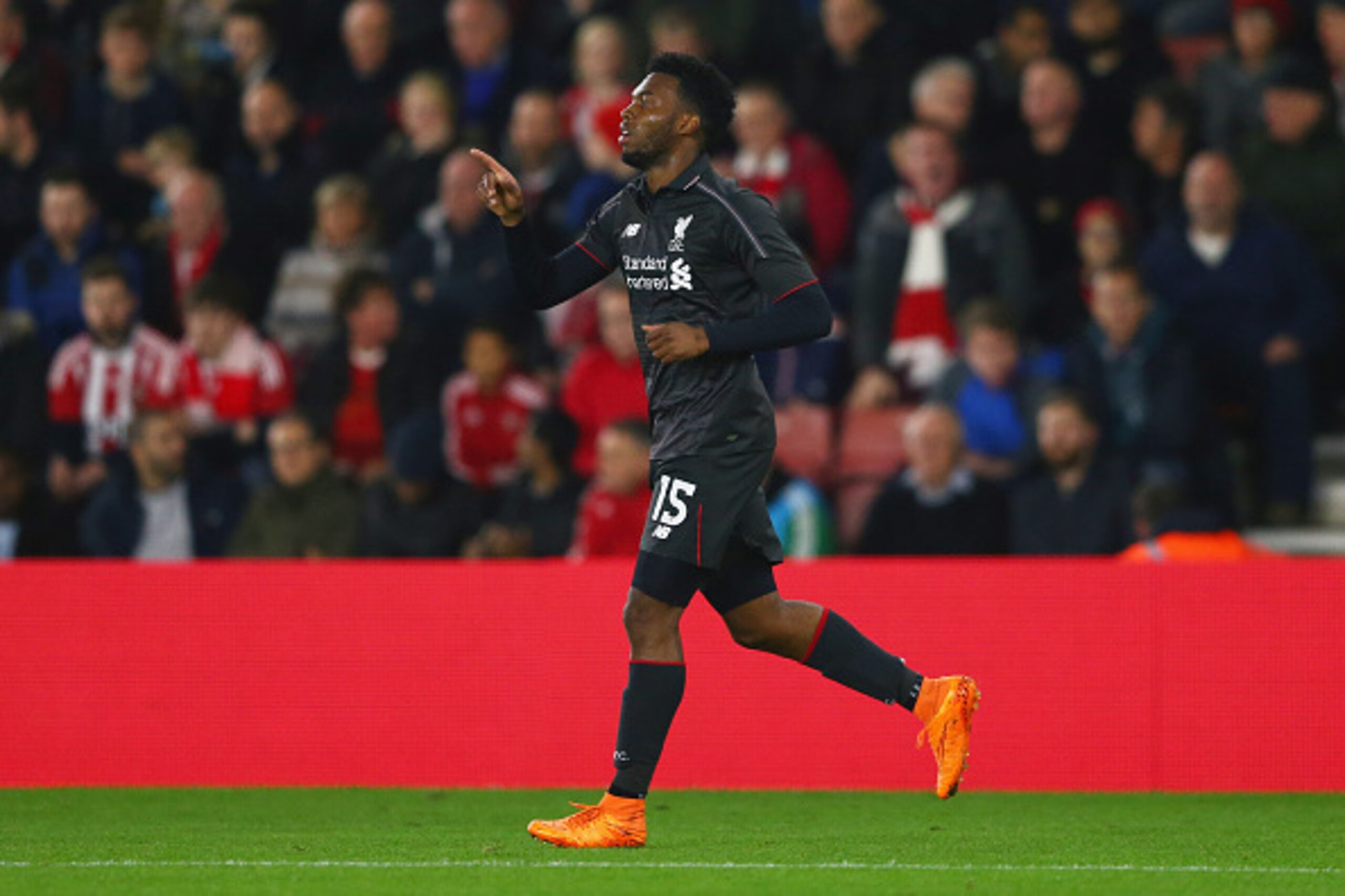 SOUTHAMPTON, ENGLAND - DECEMBER 02: Daniel Sturridge of Liverpool celebrates as he scores their first goal during the Capital One Cup quarter final match between Southampton and Liverpool at St Mary's Stadium on December 2, 2015 in Southampton, England. SOUTHAMPTON, ENGLAND - DECEMBER 02: Daniel Sturridge of Liverpool celebrates as he scores their first goal during the Capital One Cup quarter final match between Southampton and Liverpool at St Mary's Stadium on December 2, 2015 in Southampton, England.