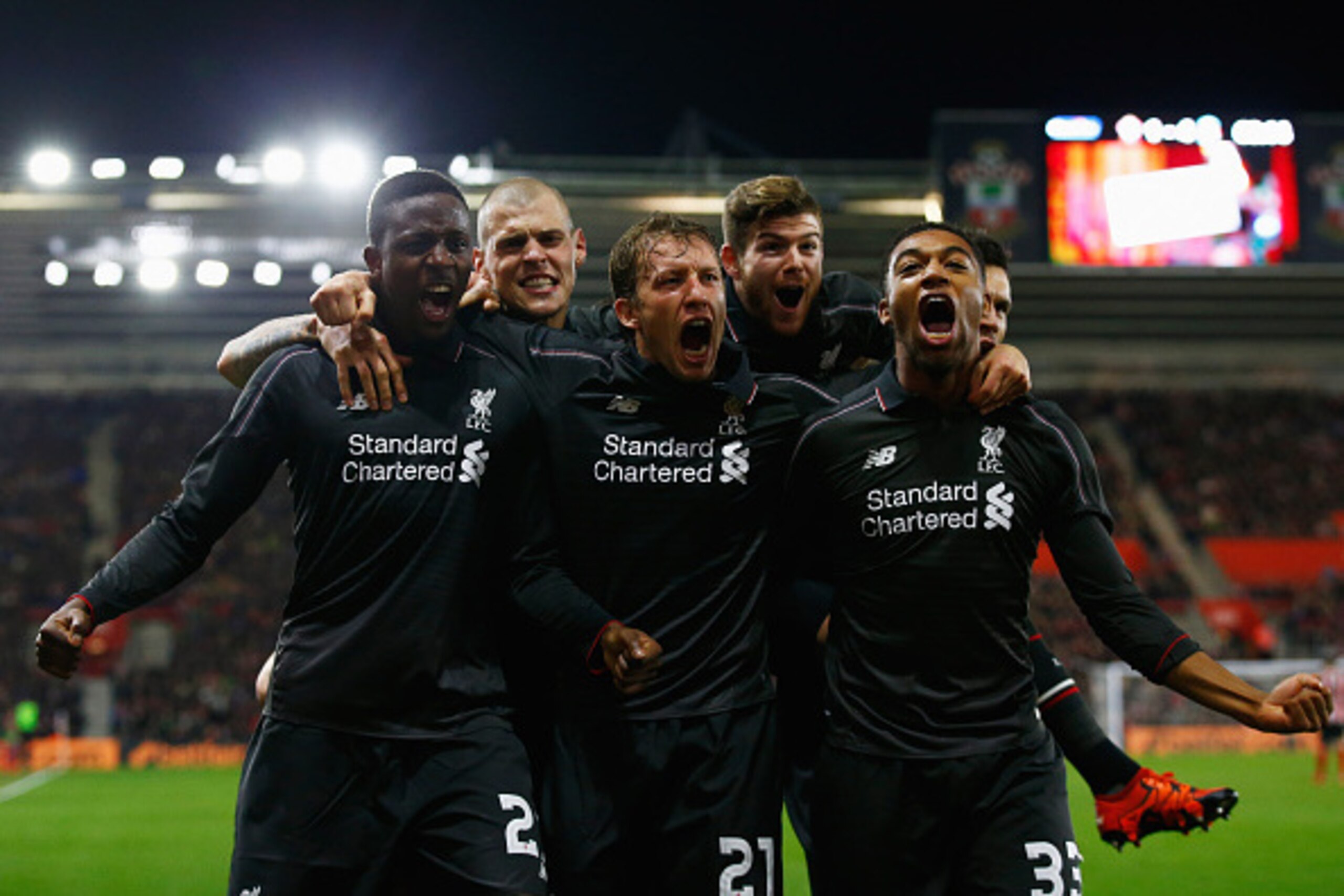 SOUTHAMPTON, ENGLAND - DECEMBER 02: Divock Origi of Liverpool (L) celebrates with team mates Lucas Leiva (21) and Jordon Ibe (33) as he scores their fourth goal during the Capital One Cup quarter final match between Southampton and Liverpool at St Mary's SOUTHAMPTON, ENGLAND - DECEMBER 02: Divock Origi of Liverpool (L) celebrates with team mates Lucas Leiva (21) and Jordon Ibe (33) as he scores their fourth goal during the Capital One Cup quarter final match between Southampton and Liverpool at St Mary's