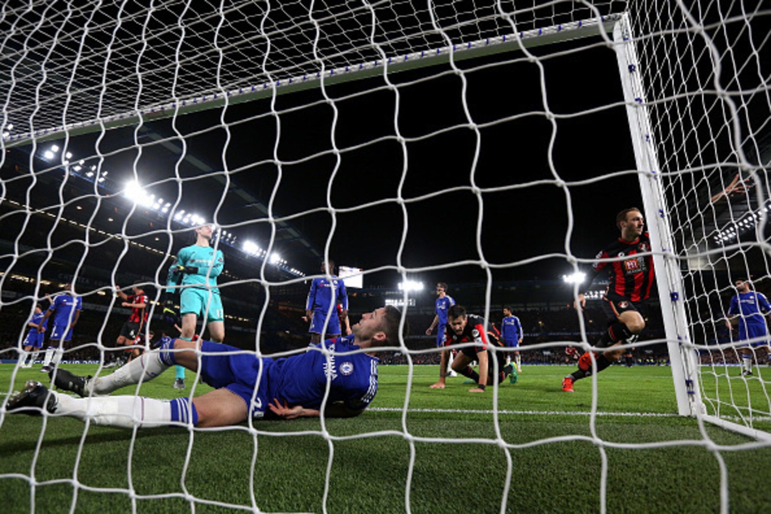 LONDON, ENGLAND - DECEMBER 05:  Glenn Murray (1sr R) of Bournemouth celebrates scoring his team's first goal during the Barclays Premier League match between Chelsea and A.F.C. Bournemouth at Stamford Bridge on December 5, 2015 in London, England.  (Photo