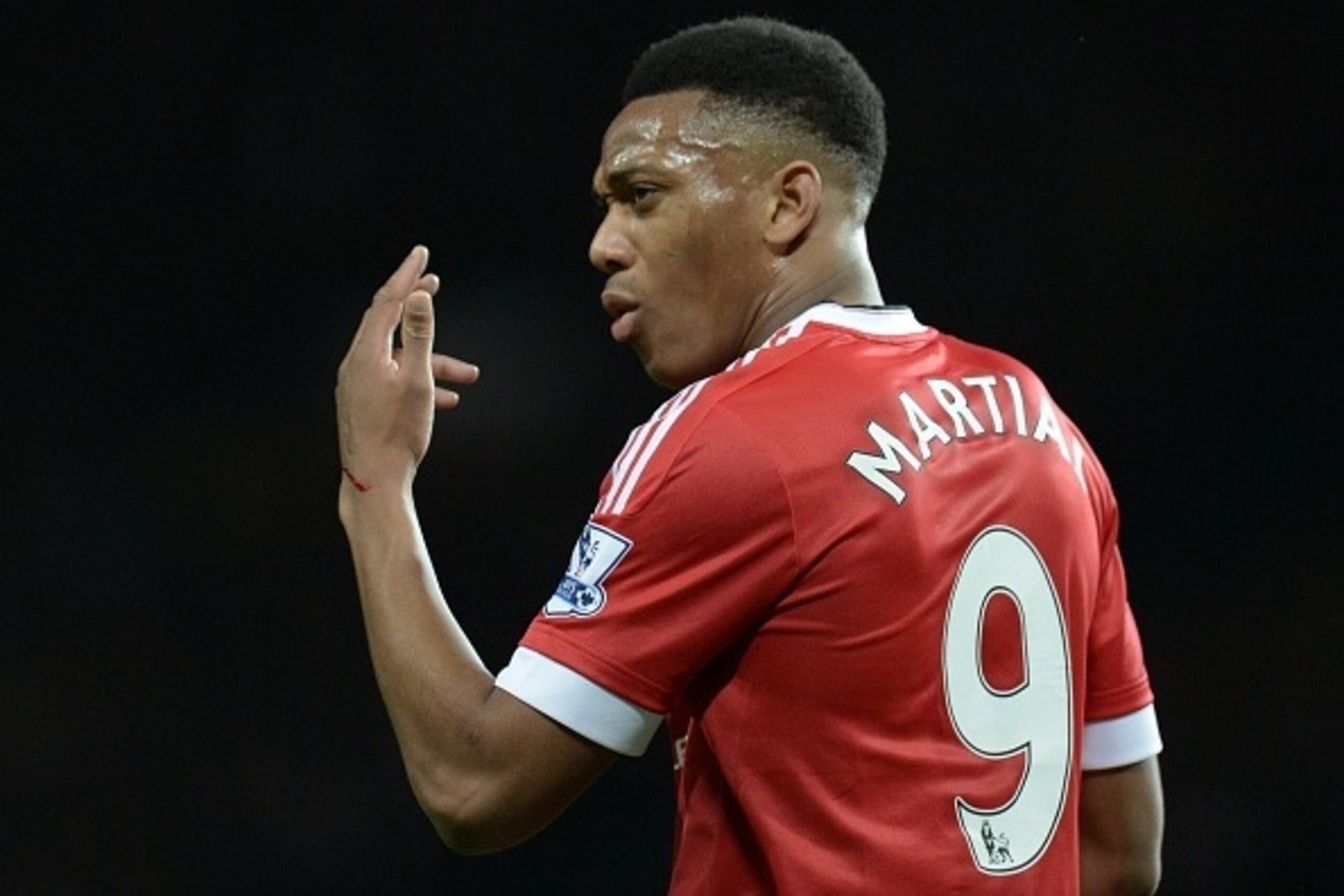 Manchester United's French striker Anthony Martial reacts during the English Premier League football match between Manchester United and West Ham United at Old Trafford in Manchester, north west England, on December 5, 2015.  AFP PHOTO / OLI SCARFF

RESTR