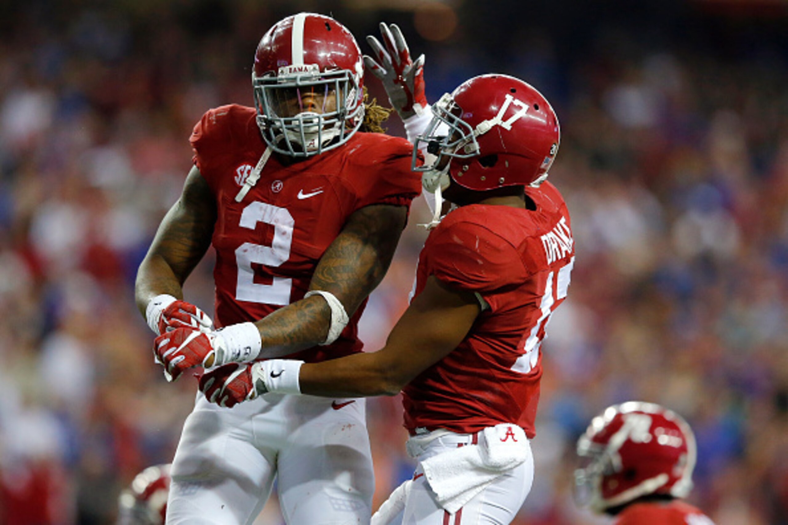 ATLANTA, GA - DECEMBER 5: Running back Derrick Henry #2 of the Alabama Crimson Tide celebrates with running back Kenyan Drake #17 of the Alabama Crimson Tides after scoring a second quarter touchdown against the Florida Gators during the SEC Championship 