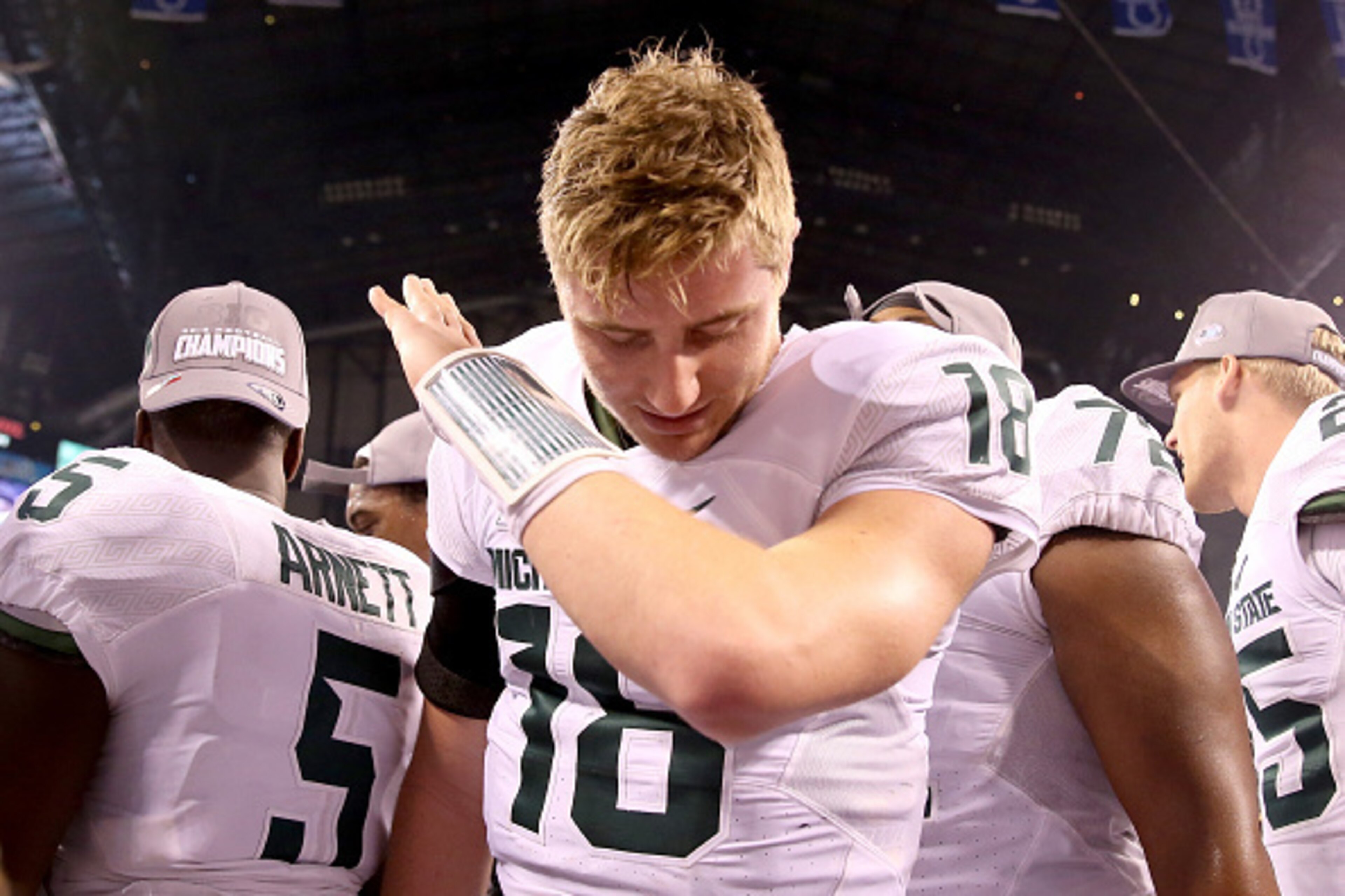 INDIANAPOLIS, IN - DECEMBER 05:  Connor Cook #18 of the Michigan State Spartans celebreates after beating the Iowa Hawkeyes in the Big Ten Championship at Lucas Oil Stadium on December 5, 2015 in Indianapolis, Indiana.  (Photo by Andy Lyons/Getty Images)