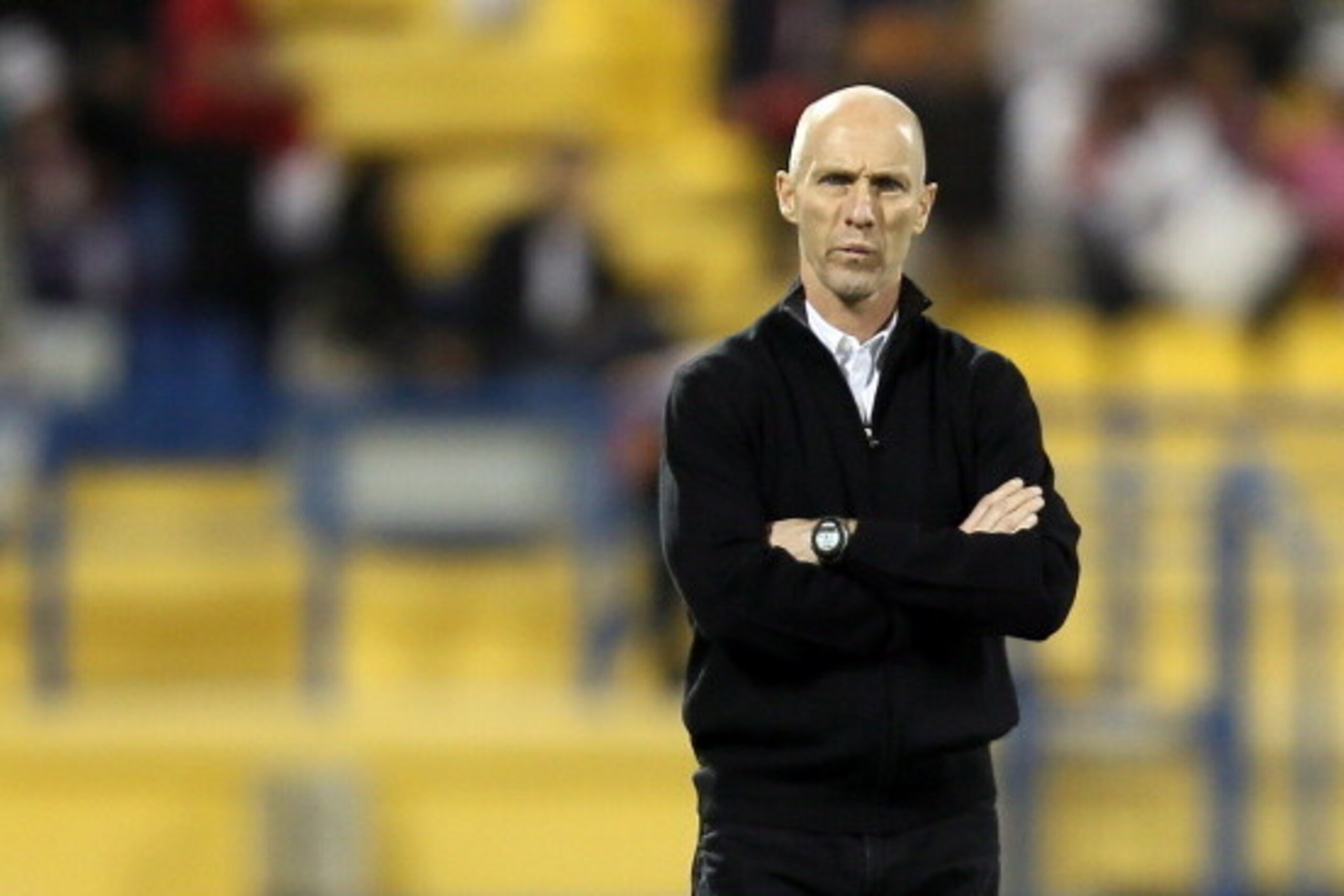 Egypt's US coach Bob Bradley watches his players during their friendly football match against Qatar in the Qatari capital Doha on March 7, 2013. The match comes in the frame of the both national teams preparation for Asian and African qualification rounds
