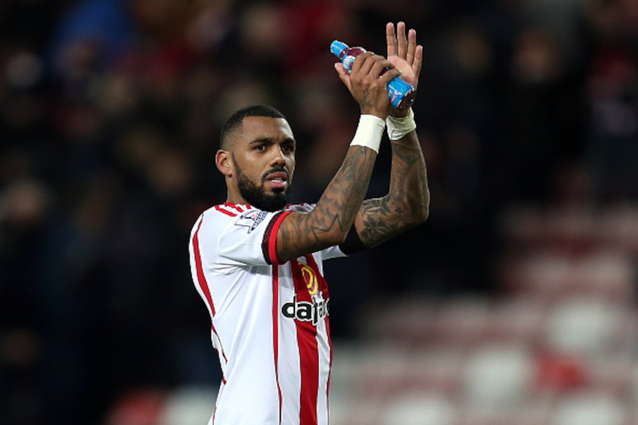 SUNDERLAND, ENGLAND - NOVEMBER 28: Yann M'Vila of Sunderland applauds the supporters at full-time following the Barclays Premier League match between Sunderland and Stoke City at Stadium of Light on November 28, 2015 in Sunderland, England. (Photo by Chri