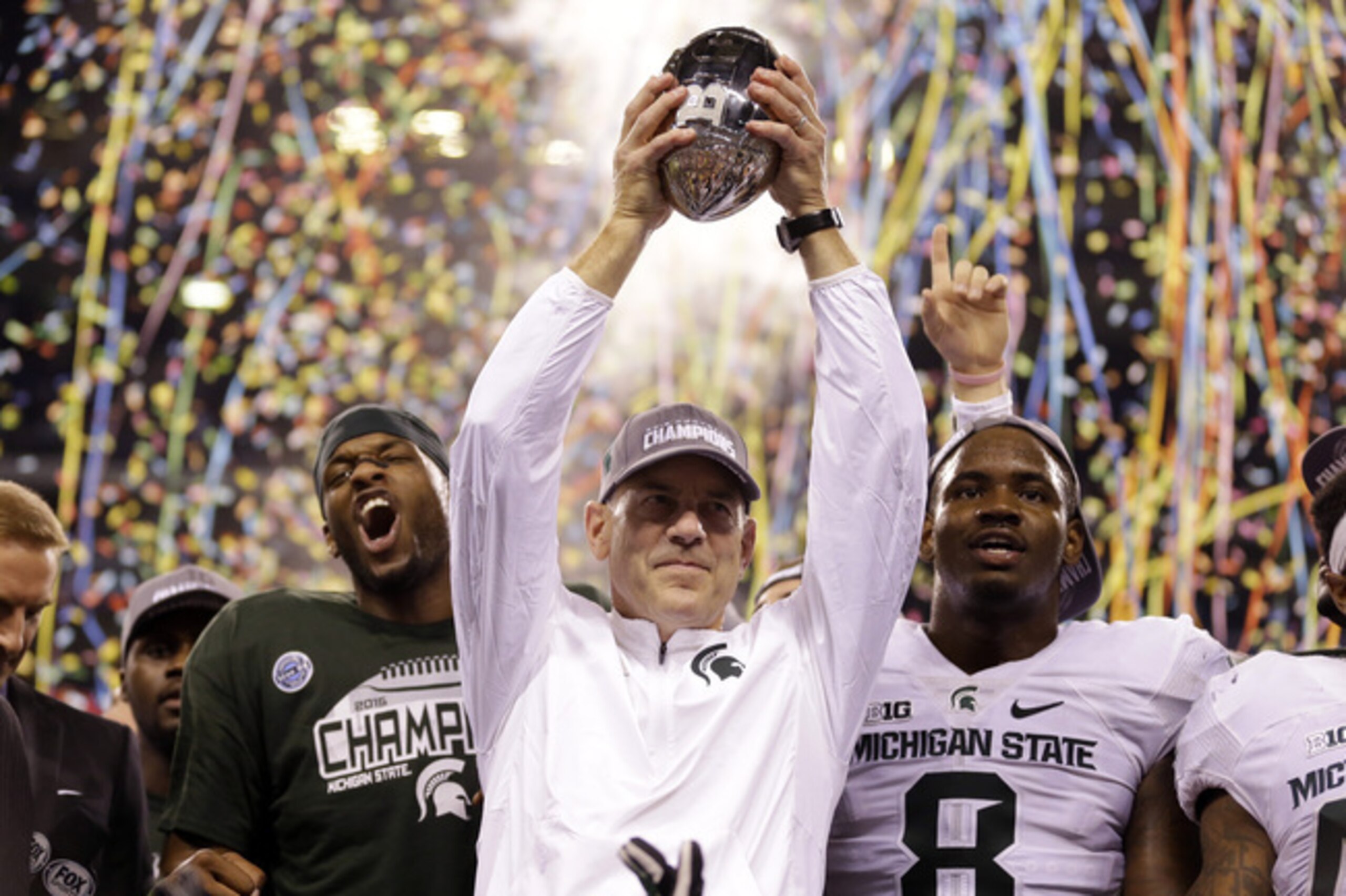 Michigan State head coach Mark Dantonio (center)