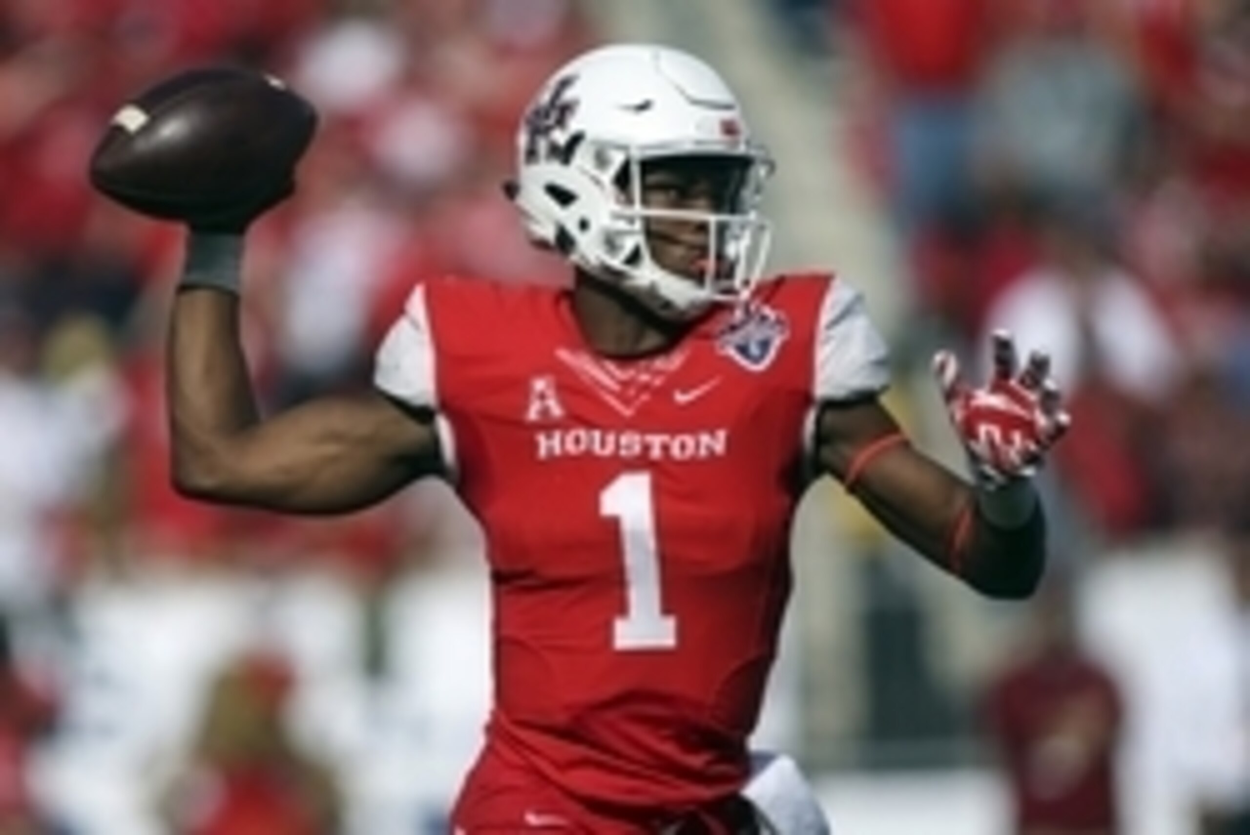 Dec 5, 2015; Houston, TX, USA; Houston Cougars quarterback Greg Ward Jr. (1) attempts a pass during the second half against the Temple Owls in the Mid-American Conference football championship game at TDECU Stadium. The Cougars defeated the Owls 24-13. Ma
