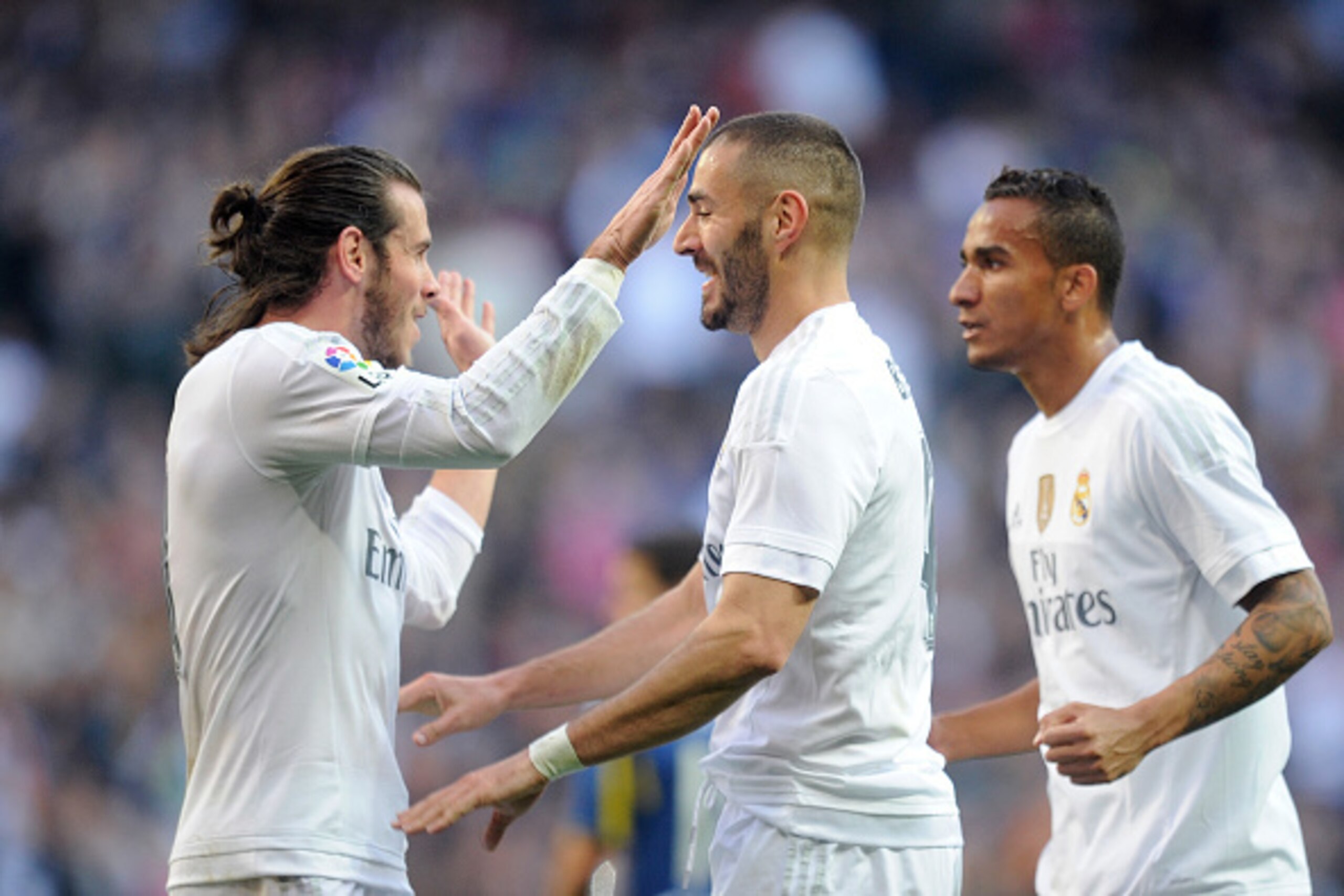 MADRID, SPAIN - DECEMBER 05:  Karim Benzema of Real Madrid celebrates with Gareth Bale after scoring his team's opening goal during the La Liga match between Real Madrid CF and Getafe CF at Estadio Santiago Bernabeu on December 5, 2015 in Madrid, Spain.  