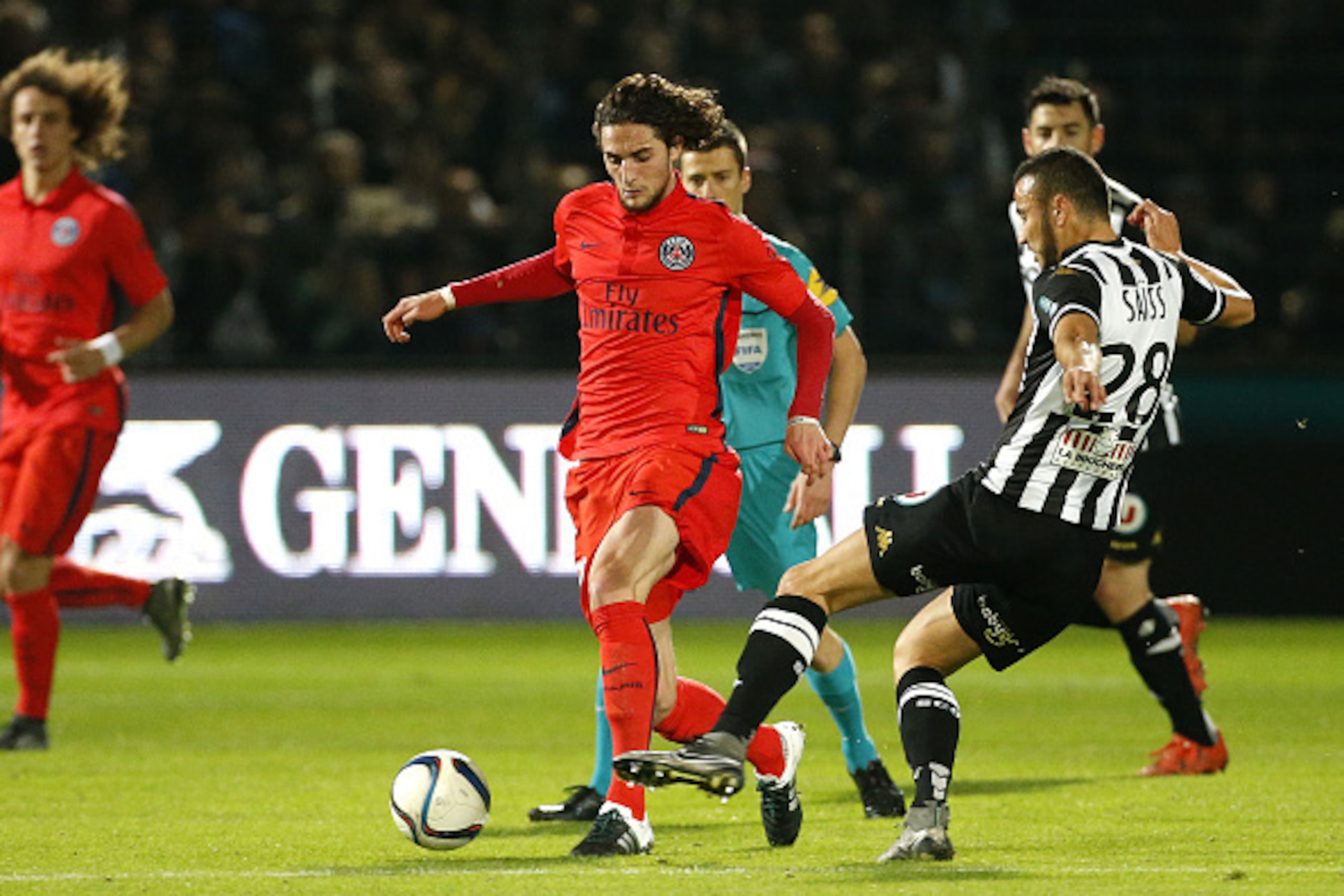 ANGERS, FRANCE - DECEMBER 1: Adrien Rabiot of PSG in action during the French Ligue 1 match between Angers SCO and Paris Saint-Germain (PSG) at Stade Jean Bouin on December 1, 2015 in Angers, France. (Photo by Jean Catuffe/Getty Images)