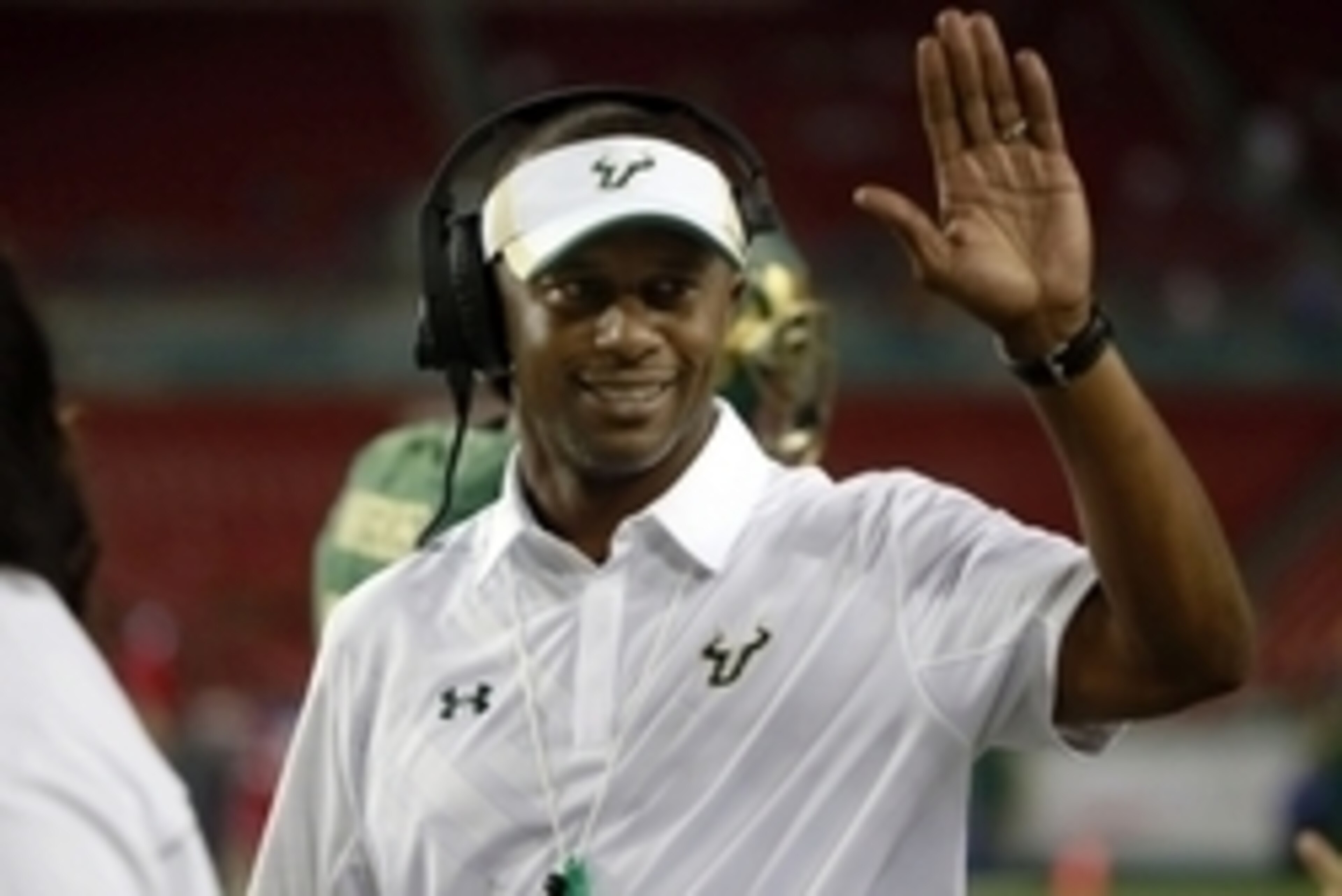 Nov 20, 2015; Tampa, FL, USA; South Florida Bulls head coach Willie Taggart high fives on the sidelines during the first quarter against the Cincinnati Bearcats at Raymond James Stadium. Mandatory Credit: Kim Klement-USA TODAY Sports