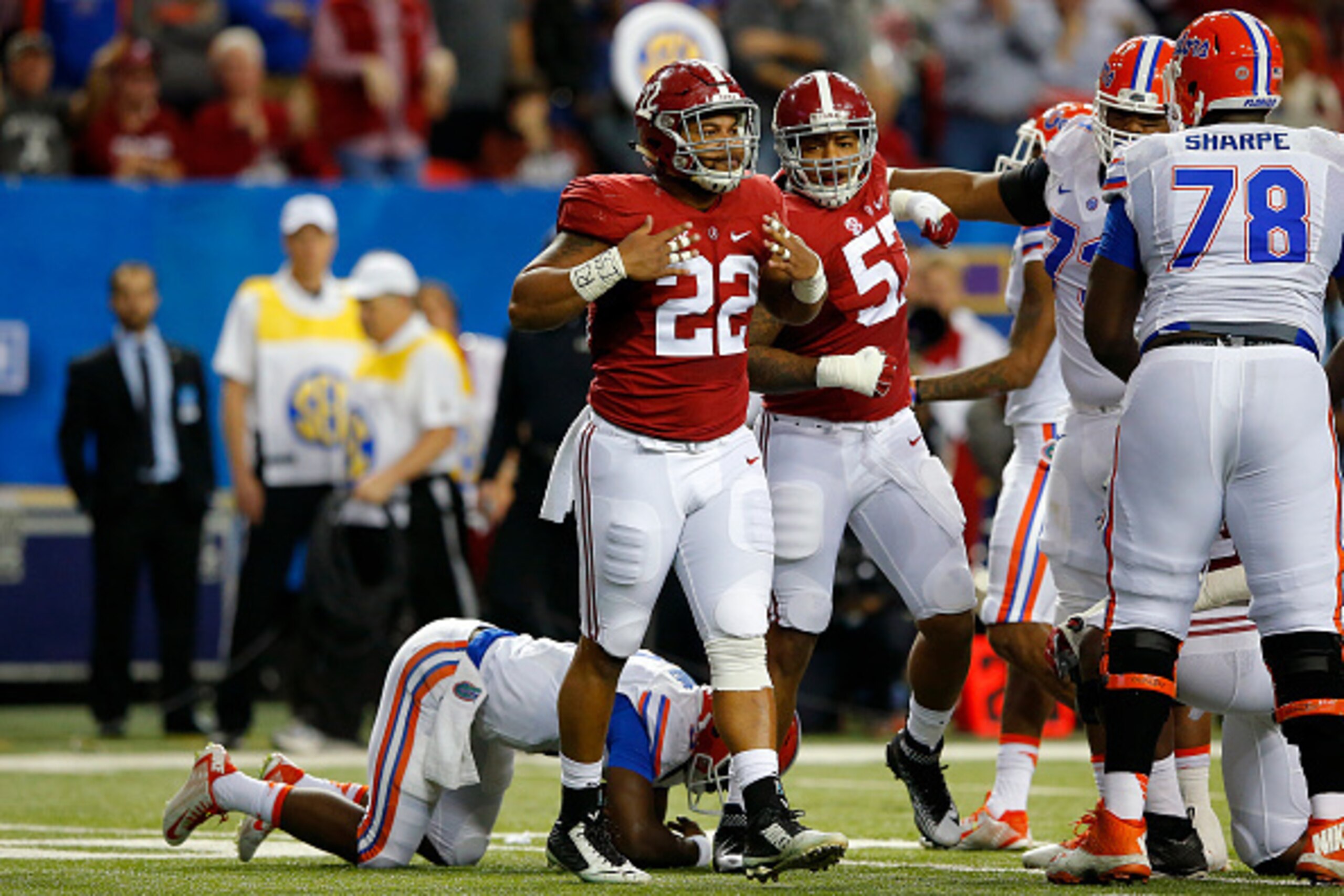 ATLANTA, GA - DECEMBER 5: Linebacker Ryan Anderson #22 of the Alabama Crimson Tide and defensive lineman D.J. Pettway #57 of the Alabama Crimson Tide react to a play against the Florida Gators in the second quarter during the SEC Championship at the Georg