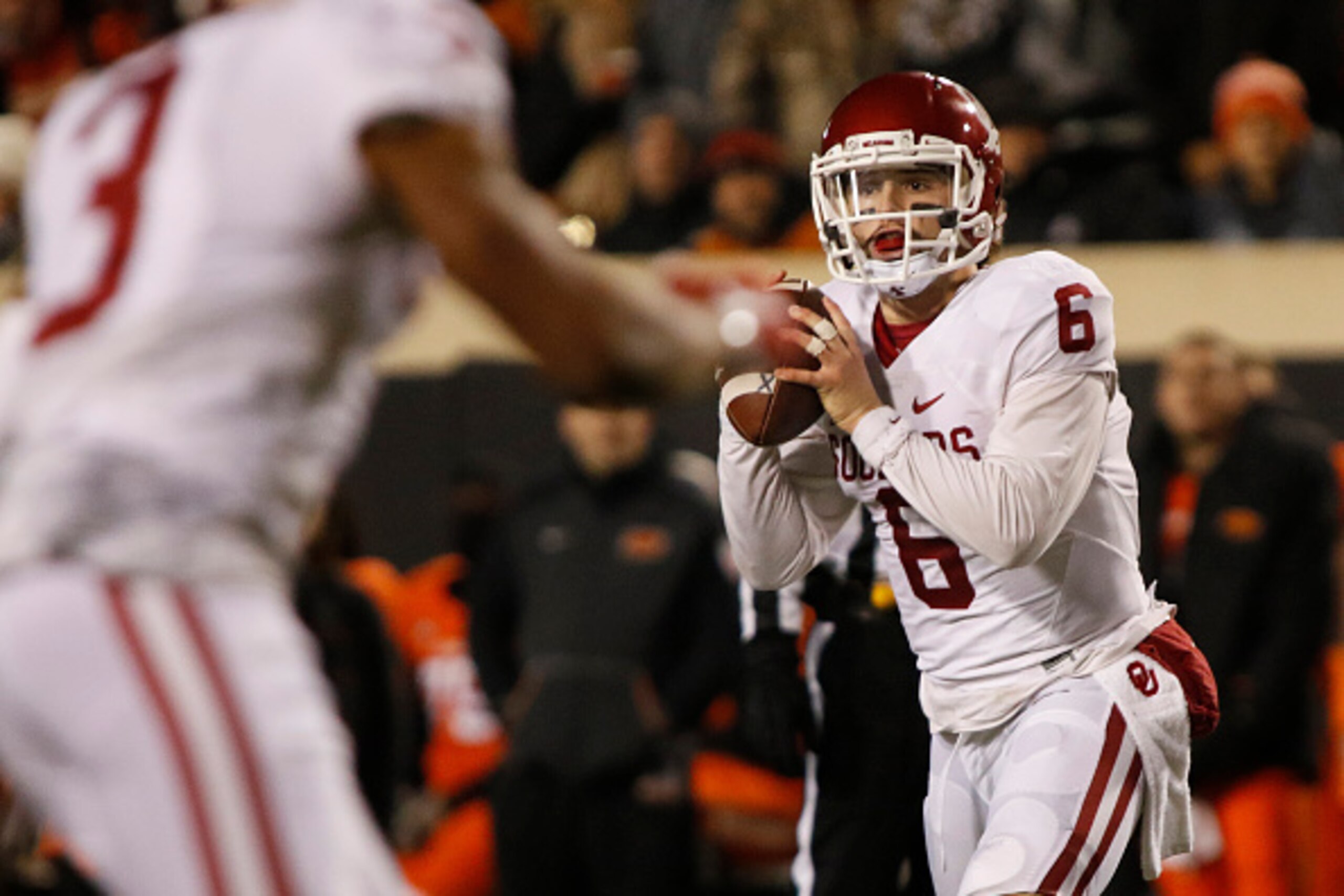 STILLWATER, OK - NOVEMBER 28 : Quarterback Baker Mayfield #6 of the Oklahoma Sooners looks to throw against the Oklahoma State Cowboys November 28, 2015 at Boone Pickens Stadium in Stillwater, Oklahoma. Oklahoma defeated Oklahoma State 58-23.(Photo by Bre