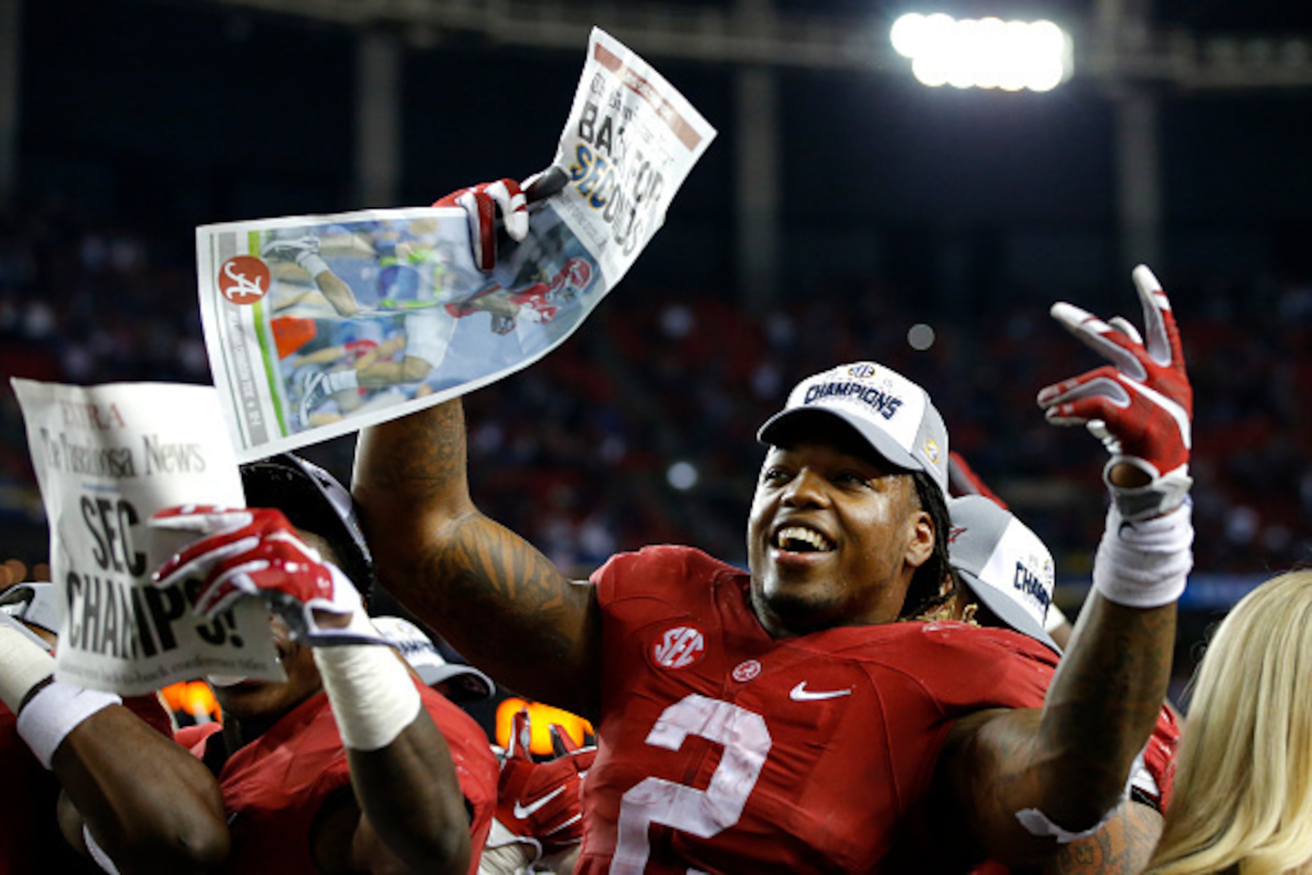 ATLANTA, GA - DECEMBER 5: Running back Derrick Henry #2 of the Alabama Crimson Tide celebrates with his team after defeating the Florida Gators 29-15 in the SEC Championship at the Georgia Dome on December 5, 2015 in Atlanta, Georgia. (Photo by Kevin C. C