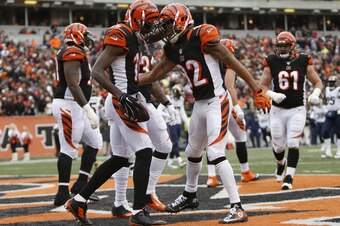 A.J. Green (with ball) and Marvin Jones each scored Sunday.