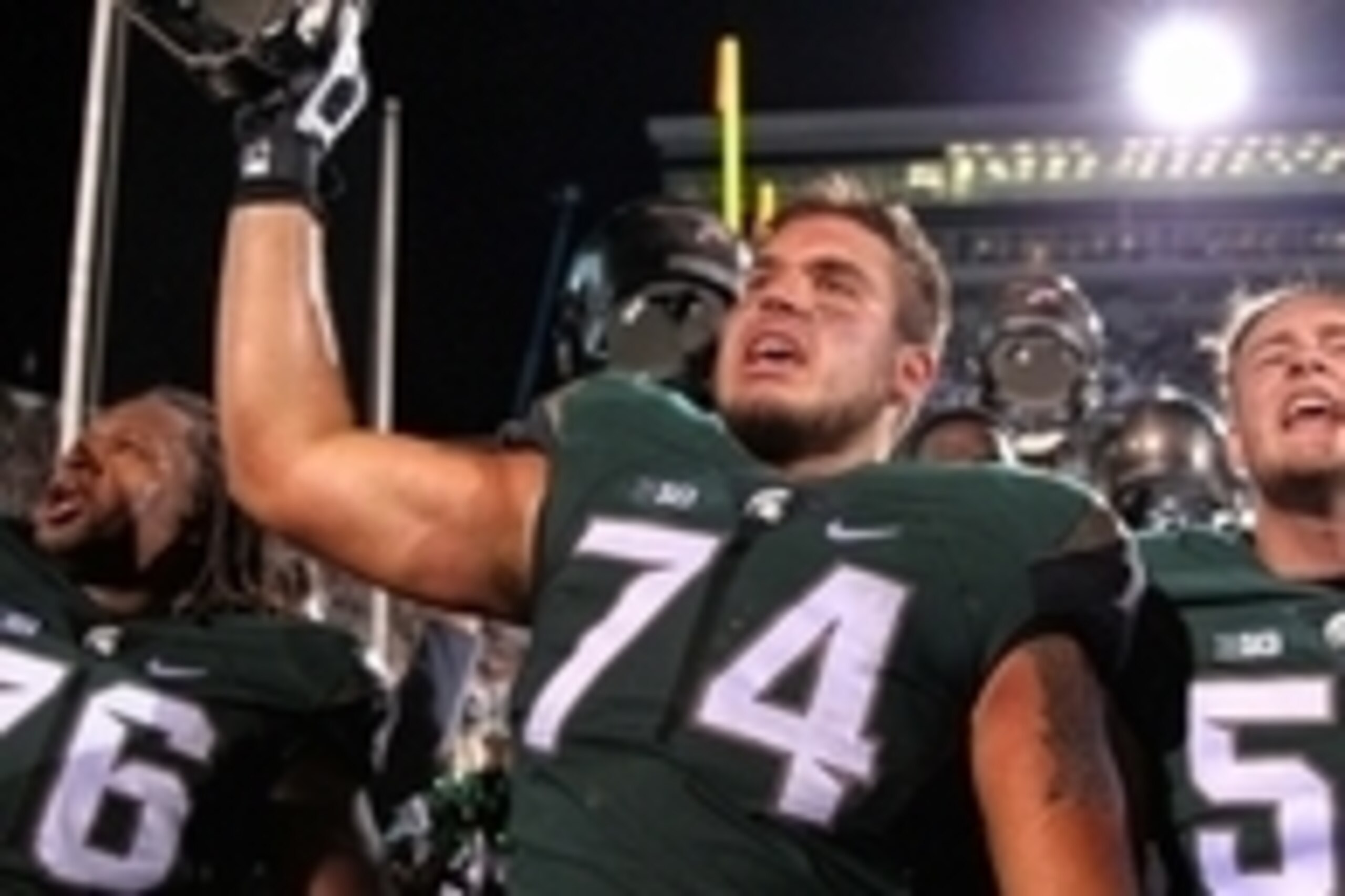 Sep 12, 2015; East Lansing, MI, USA; Michigan State Spartans offensive tackle Jack Conklin (74) celebrates the win over the Oregon Ducks after a game at Spartan Stadium. MSU won 31-28. Mandatory Credit: Mike Carter-USA TODAY Sports