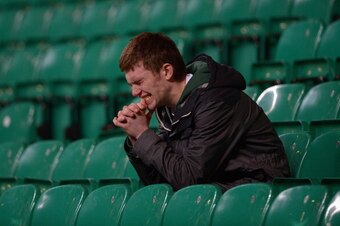 GLASGOW, SCOTLAND - FEBRUARY 12:  A Celtic fan looks dejected at the end of the UEFA Champions League Round of 16 first leg match between Celtic and Juventus at Celtic Park Stadium on February 12, 2013 in Glasgow, Scotland.  (Photo by Jeff J Mitchell/Gett