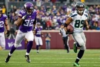 Dec 6, 2015; Minneapolis, MN, USA; Seattle Seahawks wide receiver Doug Baldwin (89) catches a touchdown pass during the third quarter against the Minnesota Vikings at TCF Bank Stadium. The Seahawks defeated the Vikings 38-7. Mandatory Credit: Brace Hemmel