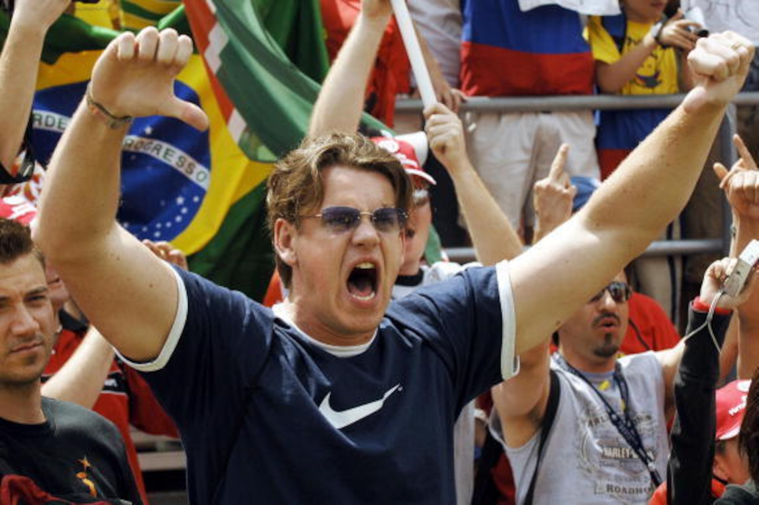 INDIANAPOLIS, UNITED STATES:  Disgruntled fans show their anger after the end of the Formula One US Grand Prix 19 June 2005 at the Indianapolis Motor Speedway. Ferrari's Michael Schumacher of Germany emerged with the victory in a US Grand Prix turned into