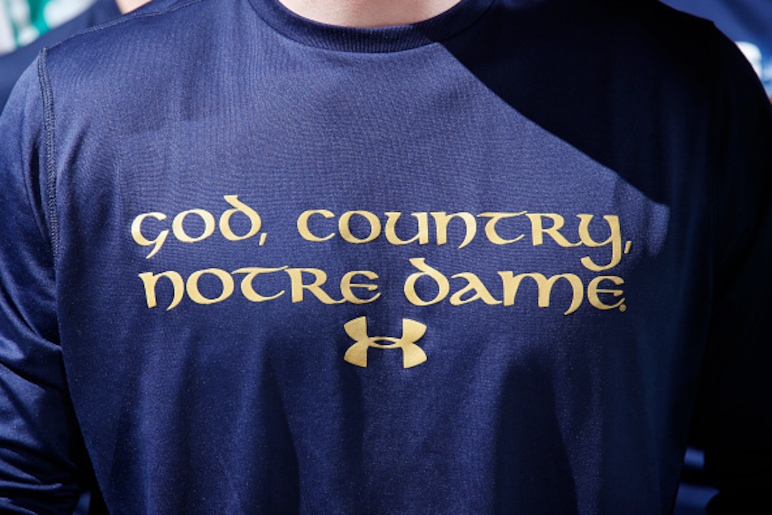 SOUTH BEND, IN - DECEMBER 13: Detail view of Under Armour Notre Dame Fighting Irish shirt worn by a fan during the men's basketball game against the Florida State Seminoles at Purcell Pavilion on December 13, 2014 in South Bend, Indiana. Notre Dame defeat