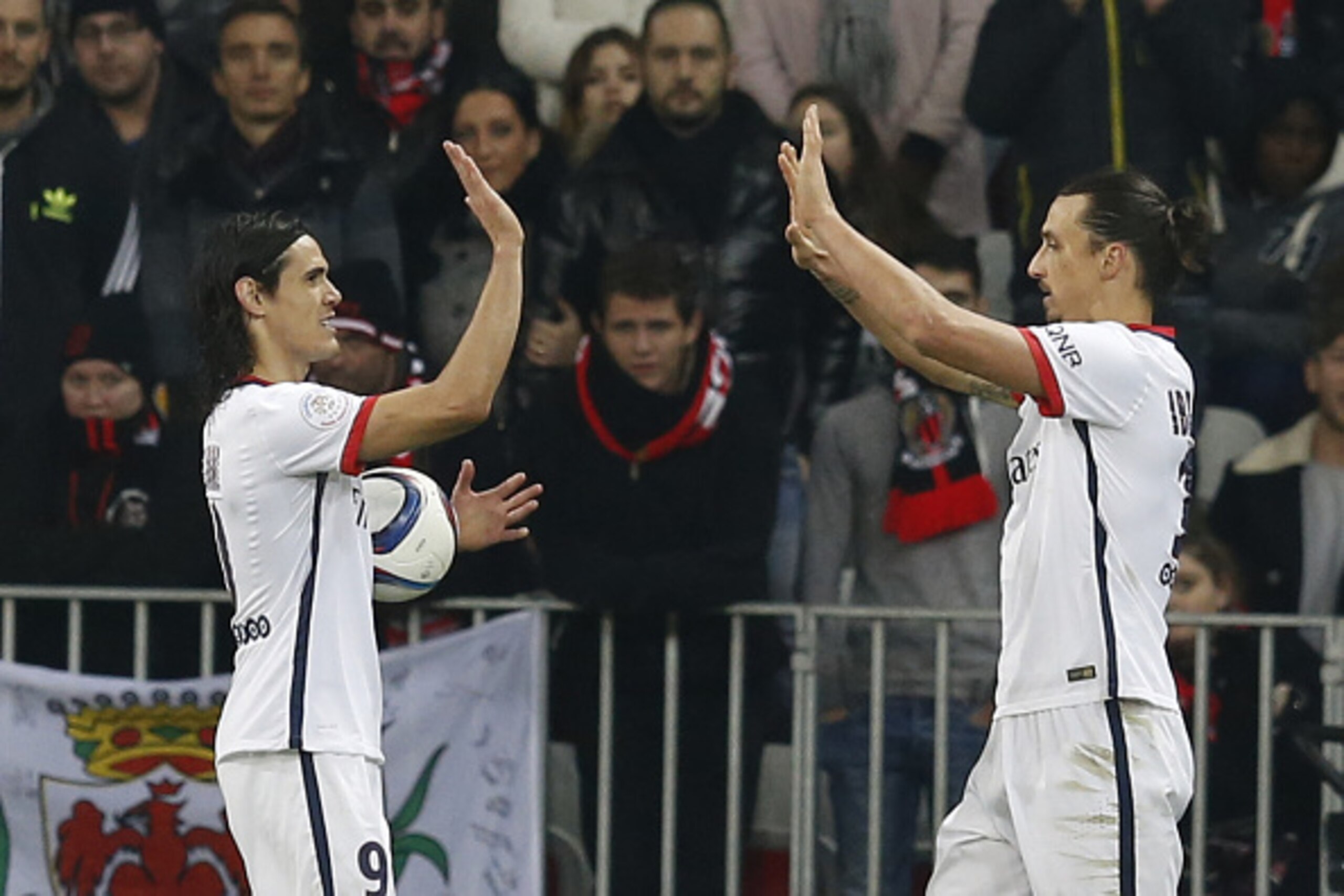 Paris Saint-Germain's Swedish forward Zlatan Ibrahimovic (R) celebrates with Paris Saint-Germain's Uruguayan forward Edinson Cavani after scoring a goal during the French L1 football match Nice (OGC Nice) vs Paris Saint-Germain (PSG) on December 4, 2015 a Paris Saint-Germain's Swedish forward Zlatan Ibrahimovic (R) celebrates with Paris Saint-Germain's Uruguayan forward Edinson Cavani after scoring a goal during the French L1 football match Nice (OGC Nice) vs Paris Saint-Germain (PSG) on December 4, 2015 a