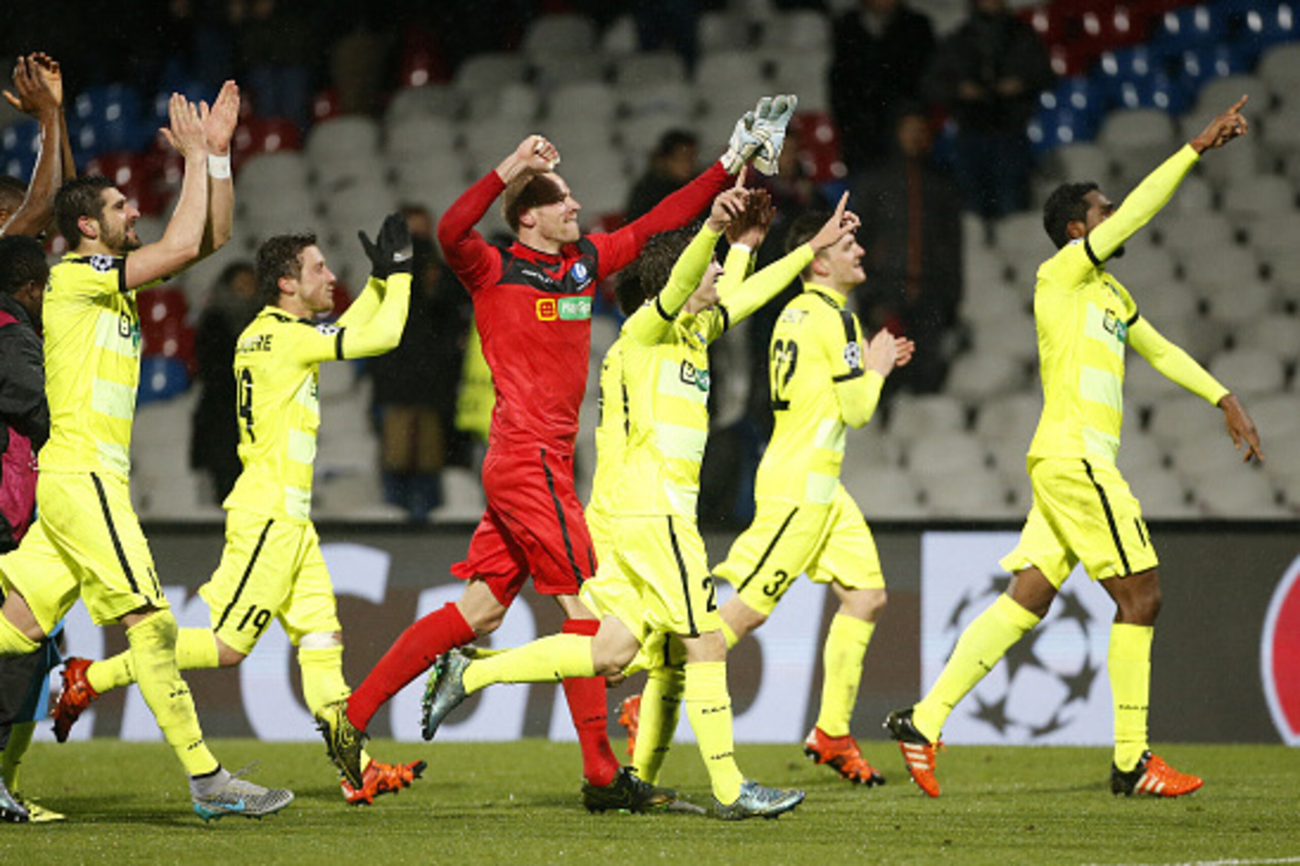 LYON, FRANCE - NOVEMBER 24: Players of KAA Gent celebrate the victory following the UEFA Champions League match between Olympique Lyonnais (Lyon, OL) and KAA Gent (Ghent, La Gantoise) at Stade de Gerland on November 24, 2015 in Lyon, France. (Photo by Jea LYON, FRANCE - NOVEMBER 24: Players of KAA Gent celebrate the victory following the UEFA Champions League match between Olympique Lyonnais (Lyon, OL) and KAA Gent (Ghent, La Gantoise) at Stade de Gerland on November 24, 2015 in Lyon, France. (Photo by Jea