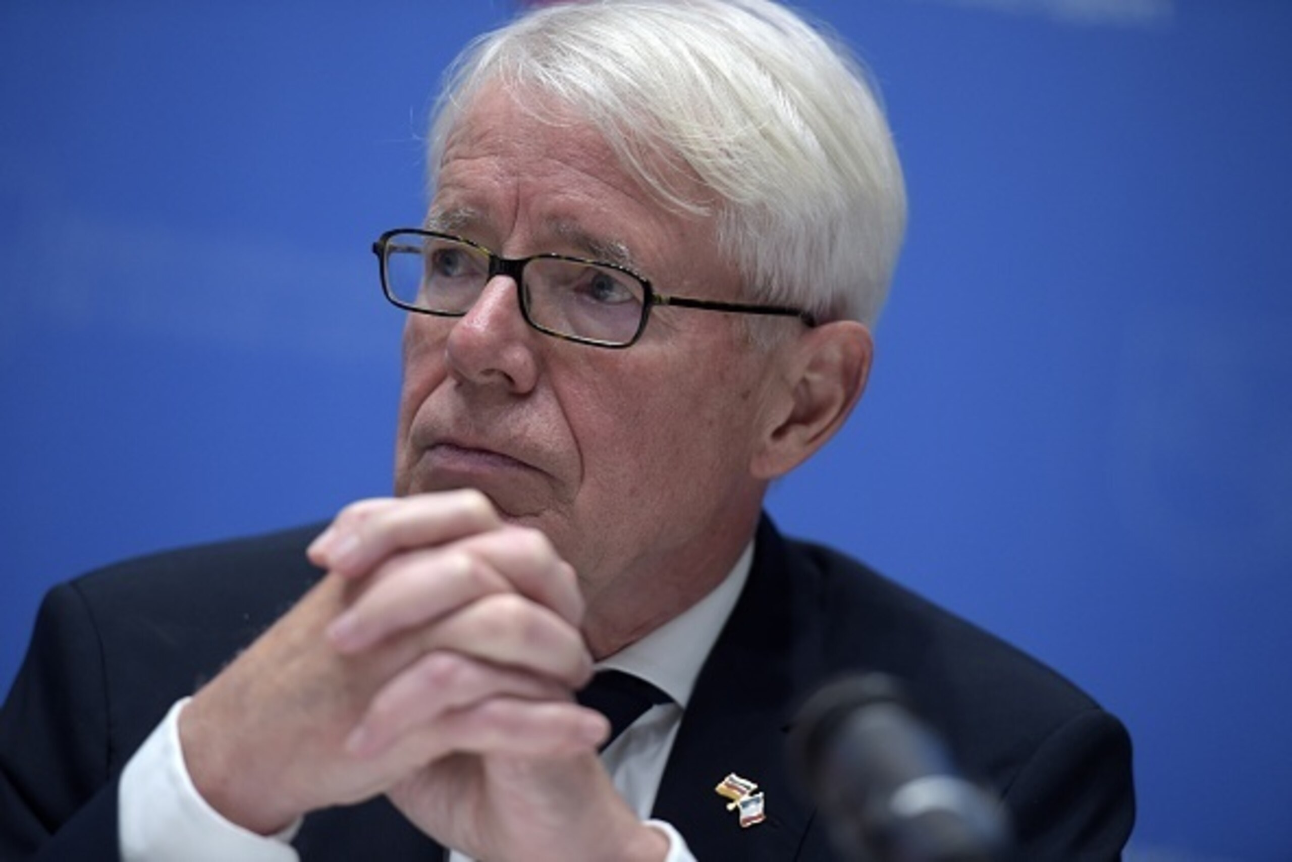 German national football federation DFB co-interim president Reinhard Rauball addresses journalists at a press conference after the friendly football match Germany vs the Netherlands was called off for 'security reasons' in Hanover on November 17, 2015.  