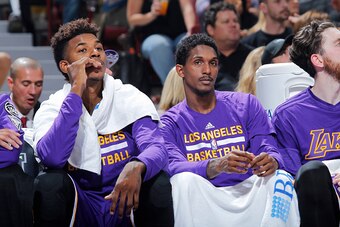 SACRAMENTO, CA - OCTOBER 30: Nick Young #0 and Louis Williams #23 of the Los Angeles Lakers look on during the game against the Sacramento Kings on October 30, 2015 at Sleep Train Arena in Sacramento, California. NOTE TO USER: User expressly acknowledges 