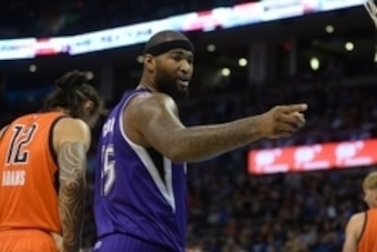 Dec 6, 2015; Oklahoma City, OK, USA;  Sacramento Kings forward DeMarcus Cousins (15) talks at a fan who was yelling at him during action against the Oklahoma City Thunder during the second quarter at Chesapeake Energy Arena. Mandatory Credit: Mark D. Smit