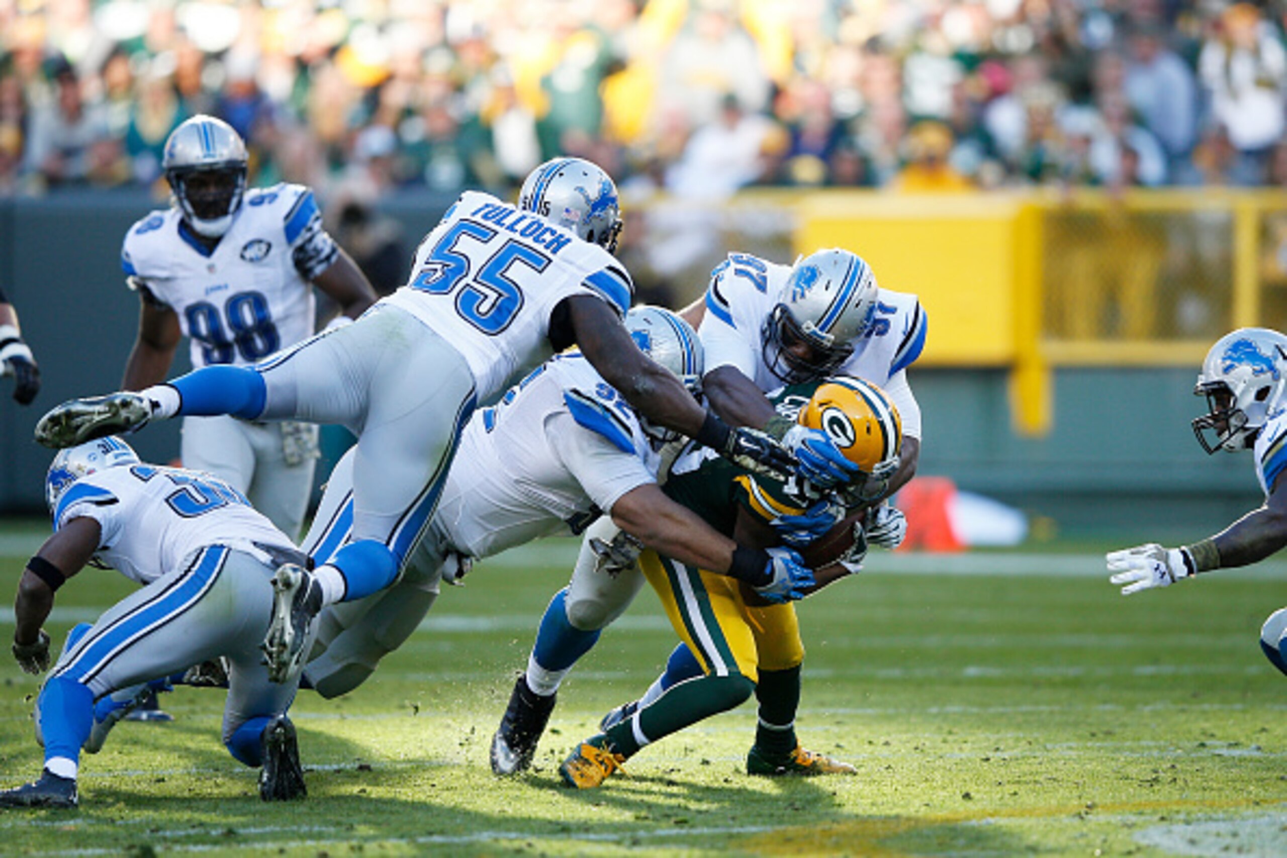 GREEN BAY, WI - NOVEMBER 15: Stephen Tulloch #55, Haloti Ngata #92, Caraun Reid #97 and Tahir Whitehead #59 of the Detroit Lions tackle Randall Cobb #18 of the Green Bay Packers during a game at Lambeau Field on November 15, 2015 in Green Bay, Wisconsin. GREEN BAY, WI - NOVEMBER 15: Stephen Tulloch #55, Haloti Ngata #92, Caraun Reid #97 and Tahir Whitehead #59 of the Detroit Lions tackle Randall Cobb #18 of the Green Bay Packers during a game at Lambeau Field on November 15, 2015 in Green Bay, Wisconsin.